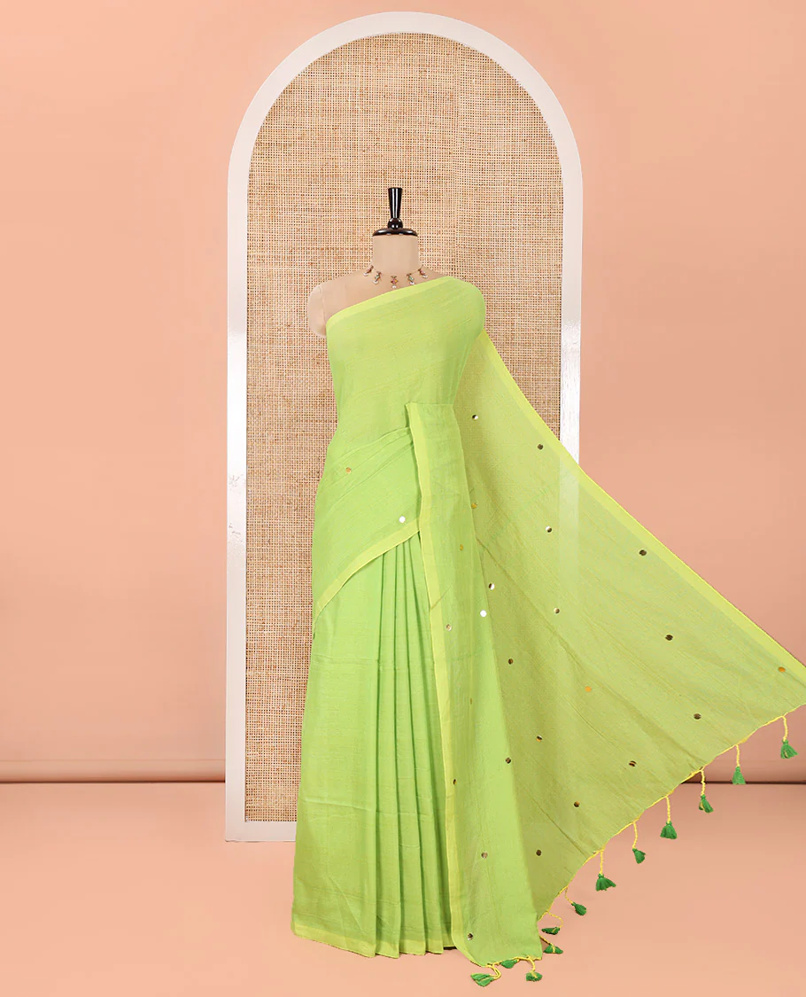 Borderless Parrot Green Mul Cotton Saree, Subtly Sparkled With Big Sequins Work On Its Body, a Self-Pallu and Paired with a Matching Blouse