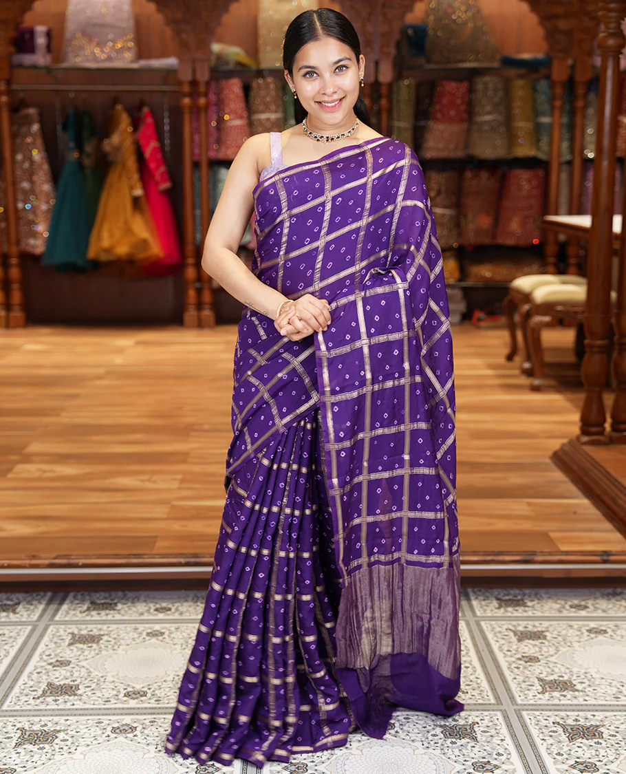 Borderless Purple Assam Silk Saree, Richly Detailed with Bandhani-Dotted Ghar Chola Design on Its Body, Gleaming Zari Pallu, and Paired with a Matching Blouse
