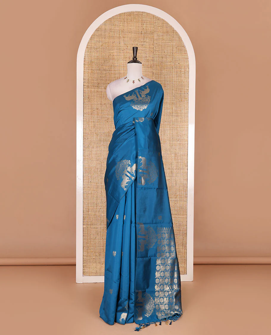 Borderless rama blue peacock, chakra, and pichwai cow buttas zari woven kanchi silk saree, peacock and chakra enclosed checked pallu, and matching blouse - Image 2