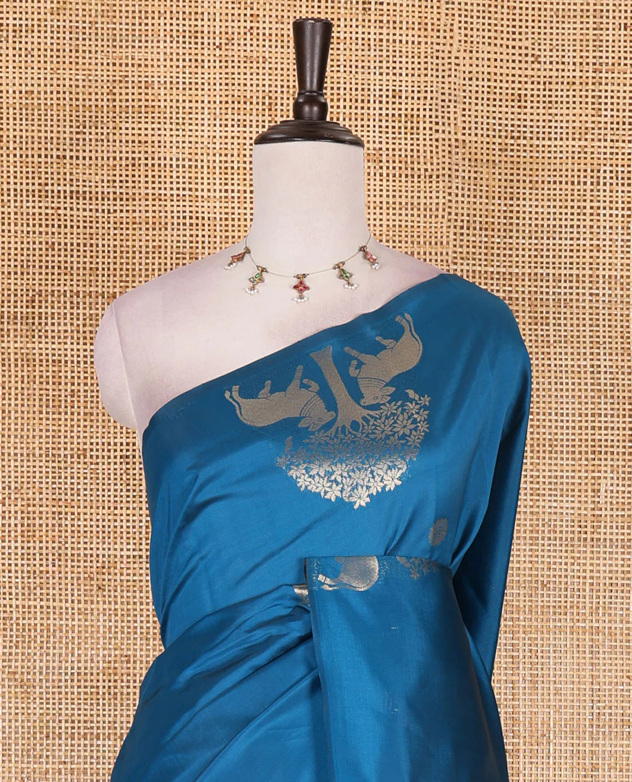 Borderless rama blue peacock, chakra, and pichwai cow buttas zari woven kanchi silk saree, peacock and chakra enclosed checked pallu, and matching blouse - Image 3