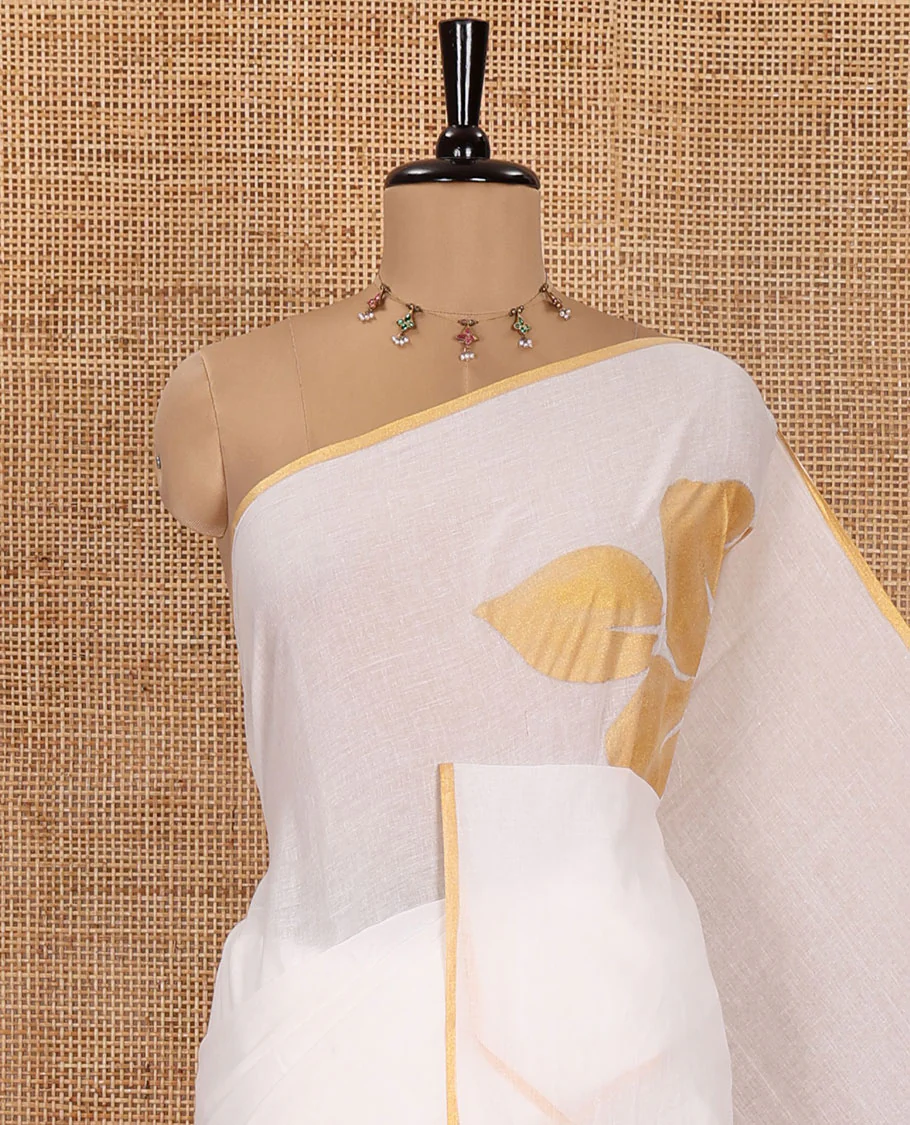 Borderless White Khadi Mul Cotton Saree, Enthralled with Big Hibiscus Floral Motifs Foil-Printed on Its Body, Subtly Sparkled Pallu of the Same Print and Tassels, and Paired with a Matching Blouse - Image 2
