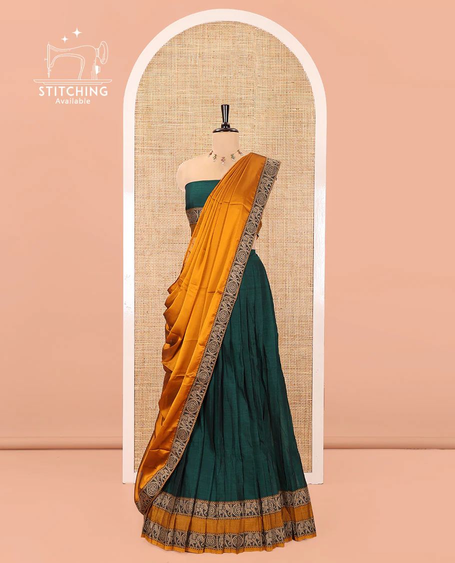 Bottle Green-Mustard Mercerised Cotton Half-Saree Features Plain with Contrast Rettai Pettu Elephant-Chakram Bordered Skirt, Paired with a Matching Blouse, and Comes with a Contrast Elephant-Chakram-Bordered Dhavani - Image 3