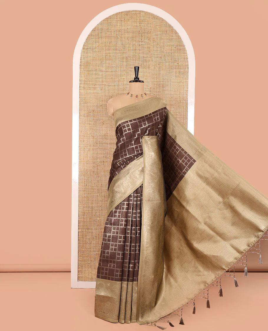 Brown Elite Soft Silk Saree, Highlighted by Checked Design on Its Body, Complemented by a Contrast Border of Jungle-Themed Flora-Fauna Motifs, a Pallu of Checked Design, and Paired with a Contrast Blouse