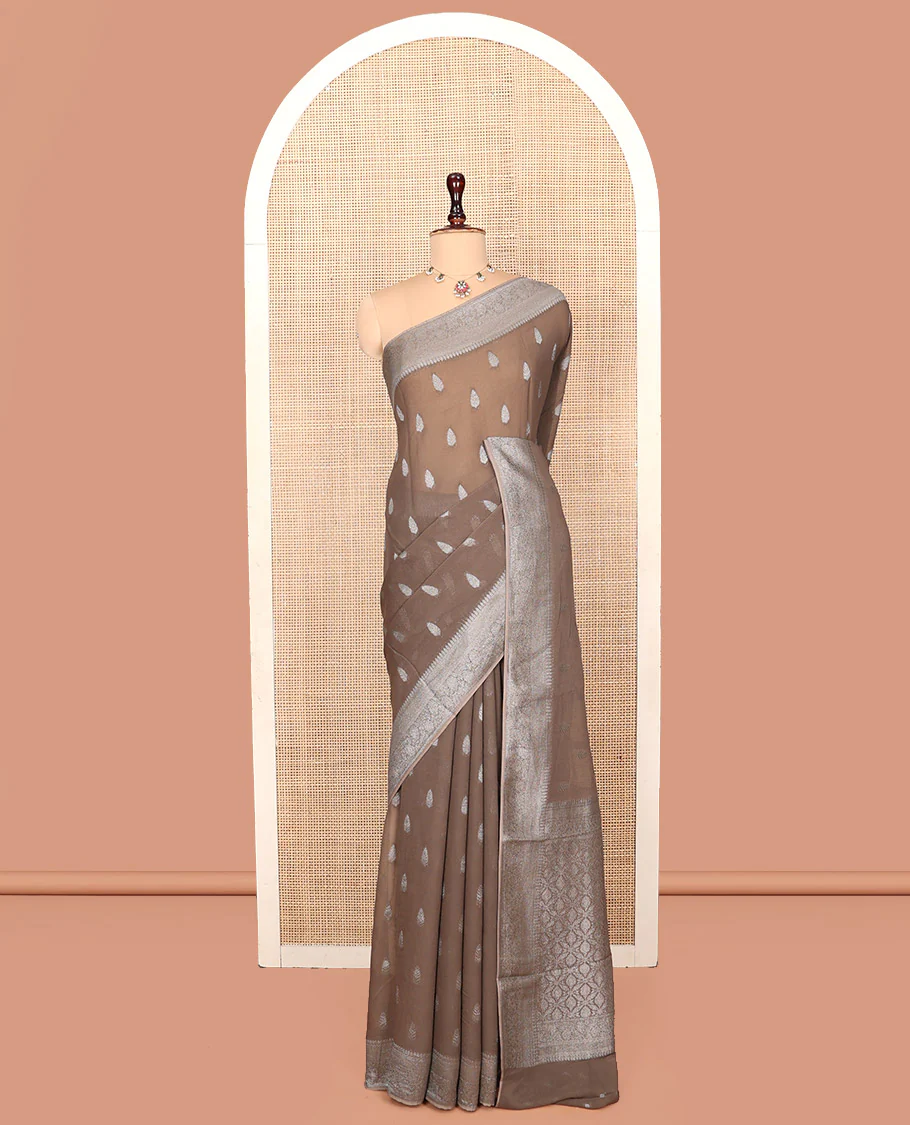 Brown Georgette Saree, Steeped with Buttas, Highlighted by a Traditional Floral Creeper Border, Intricately Designed Pallu, and  a Matching Blouse - Image 2