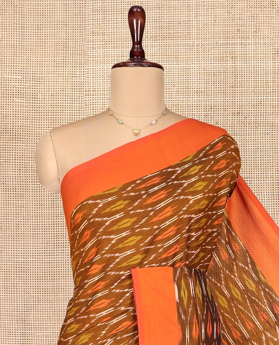 Brown Ikkat Cotton Saree, Decked Up with Ikkat-Style Ogee Patterns on Its Body, Complemented by Contrast Plain Border, Pallu Steeped with Ikkat Buttas, and Has No Blouse - Image 2