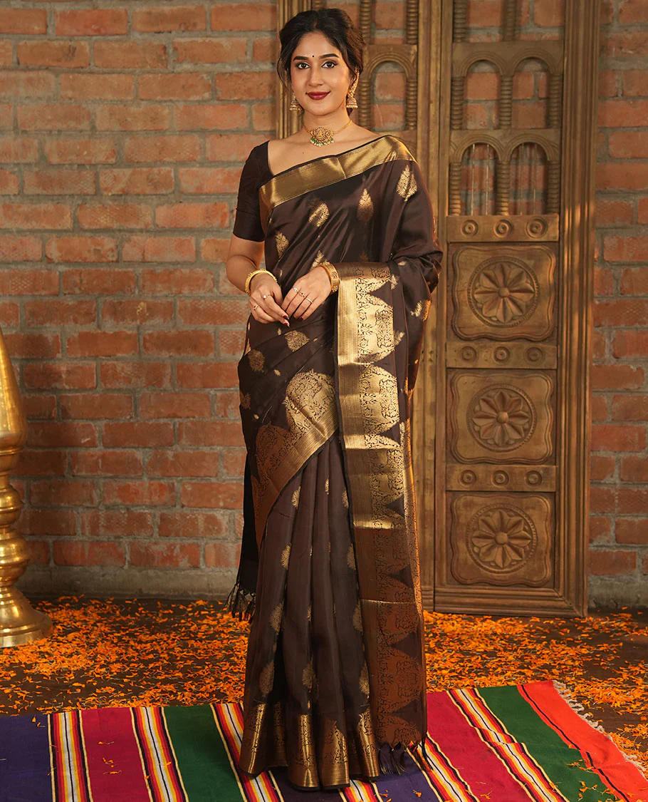 Brown Vasundhara Lite-Silk Mix Saree, Elevated with Zari Buttas All Over Its Body, Highlighted by Zari Border of Neli, Kuyil Kann, Kathir, and Maan Designs, Gracefully Embellished Pallu of Jaal Design, and Paired with a Matching Blouse