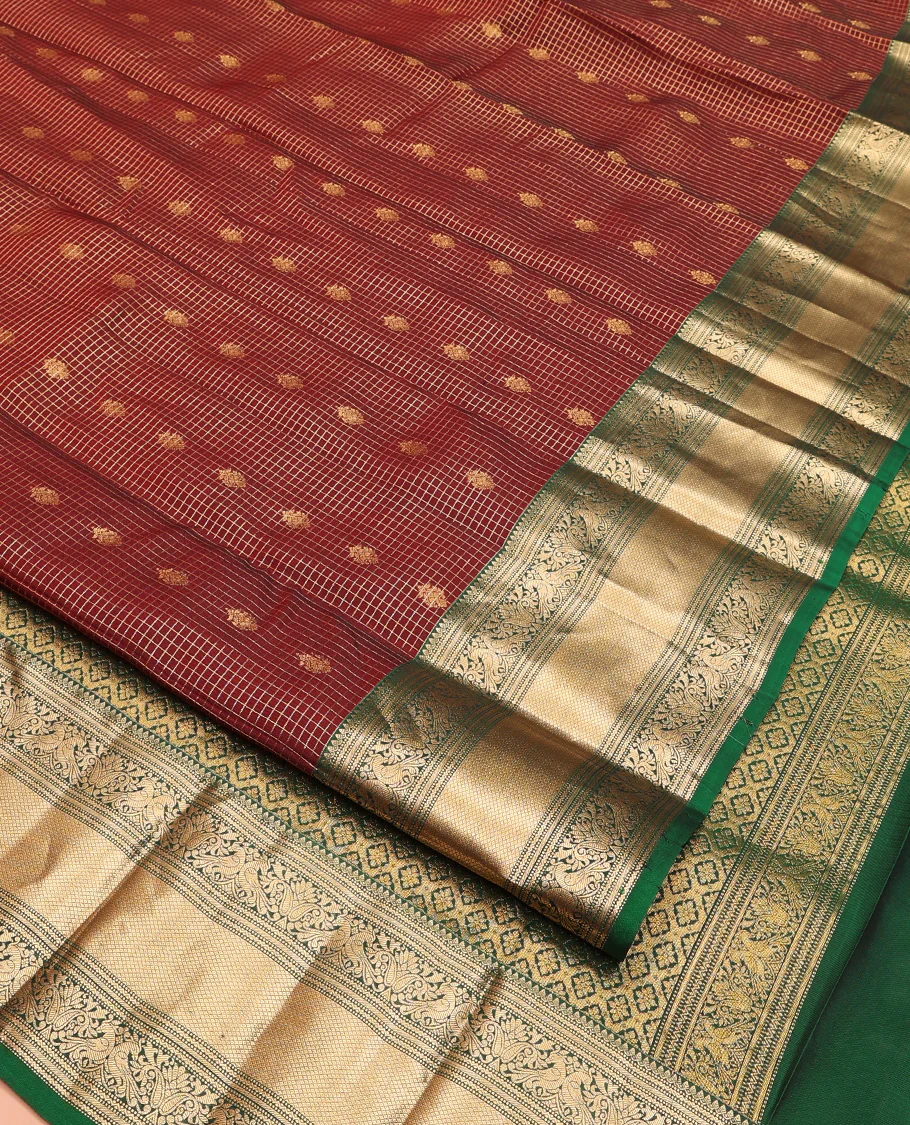 Brown Vasundhara Lite Silk Mix Saree, Meticulously Crafted with Zari Buttas and Checks On Its Body, Complemented by Contrast Border of Thilakam Mokku, Muthu, Banaras, Mayil, and Mayil Kann Designs, Grandly Decked Up Pallu and Paired with a Contrast Blouse - Image 2