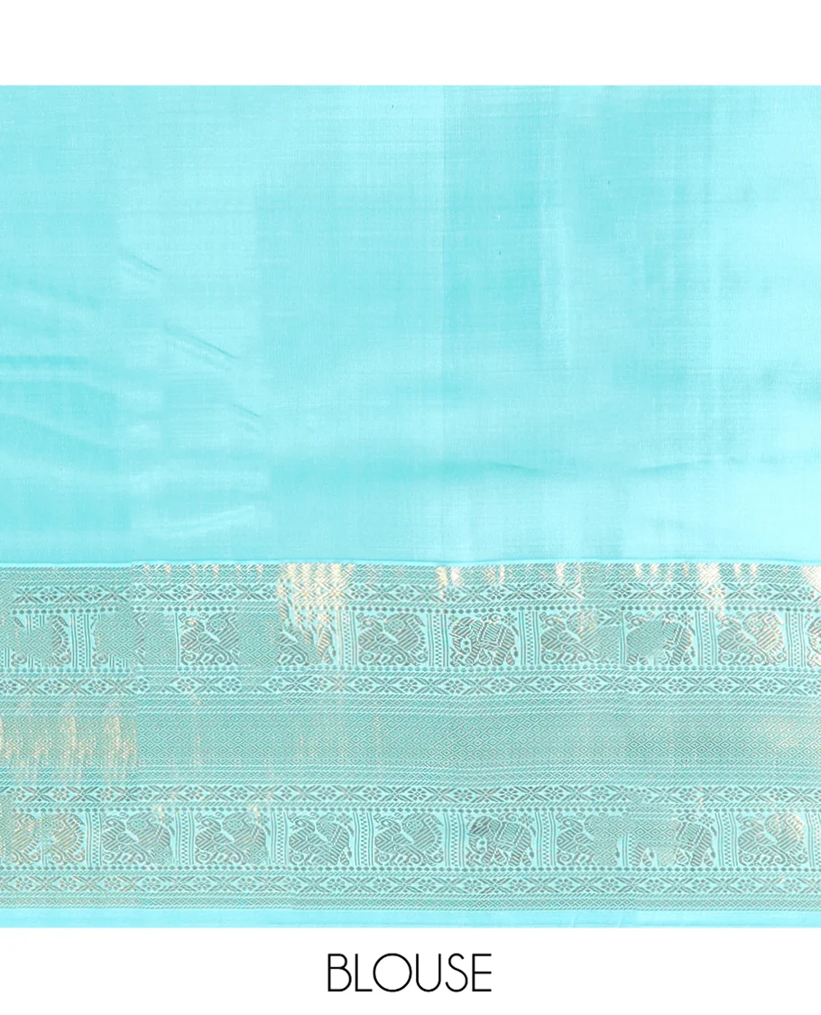 Brown Vasundhara Silk Saree Delicately Woven with Zari Buttas, Highlighted with a Contrast Border of Cross Kamalam, Mayil, Banaras, Yaanai, and Mayil Kann Designs, Pallu Grandly Woven with Jaal Designs, and Paired with a Contrast Blouse - Image 7