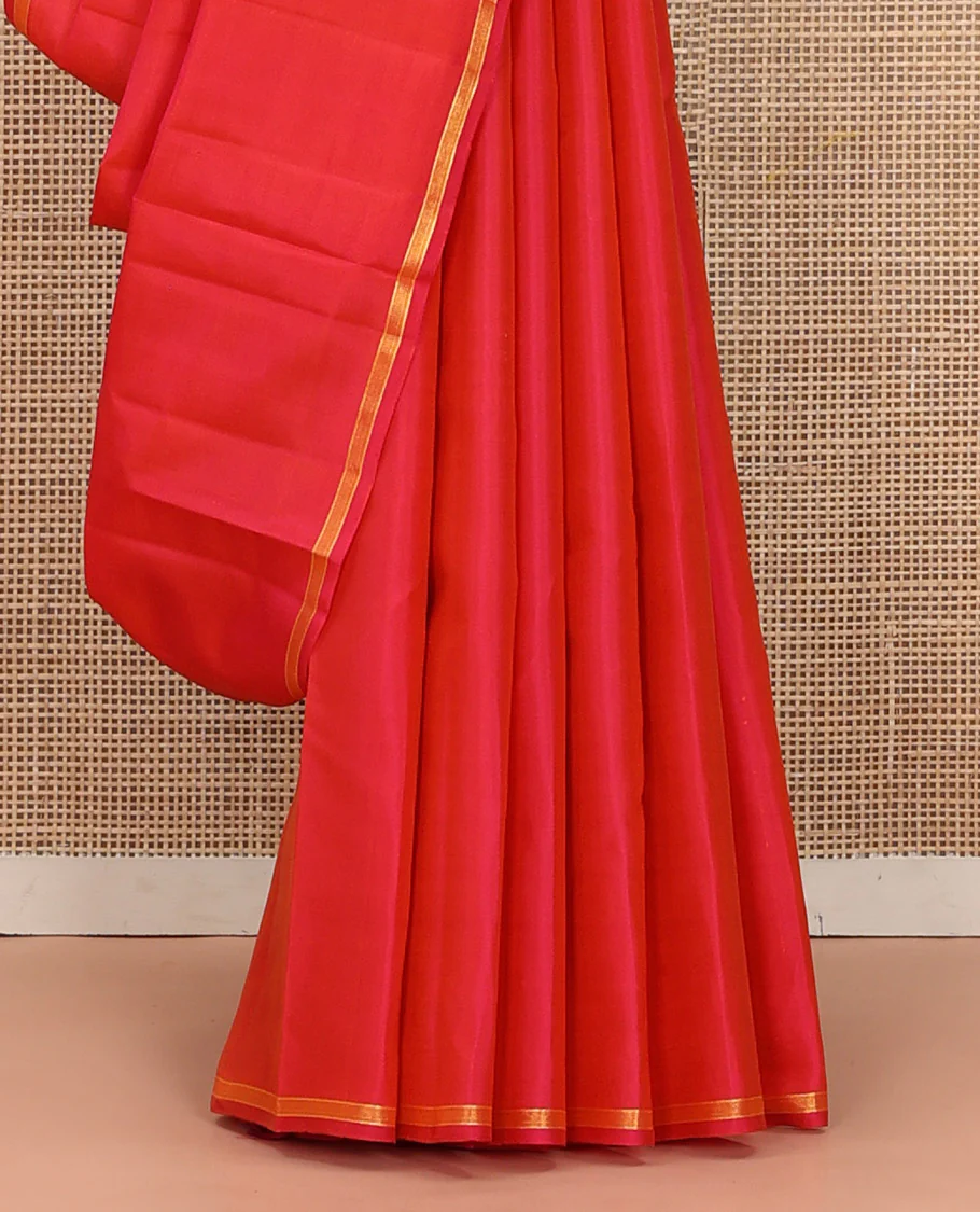 Captivating Pink Plain Kanchipuram Silk Saree, Subtly Woven Zari Striped Border, Complemented by Vibrantly Colored Pallu of Zari Buttas, and Paired with a Contrast Blouse - Image 4