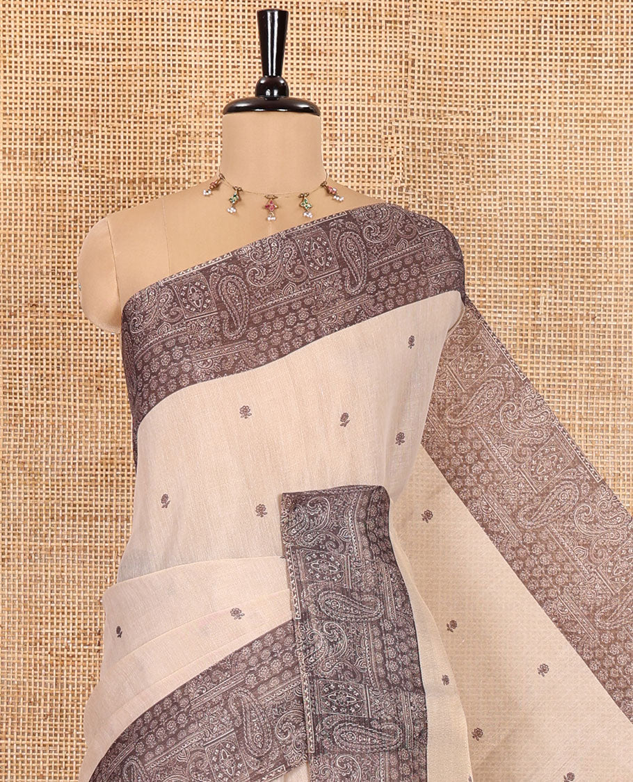 Chikku and Black Tissue Linen Saree, Delicately Printed with Floral Motifs on Its Body, Complemented by a Contrast Border of Paisley Designs, Pallu Steeped with Paisley Designs, and Paired with a Contrast Blouse - Image 8