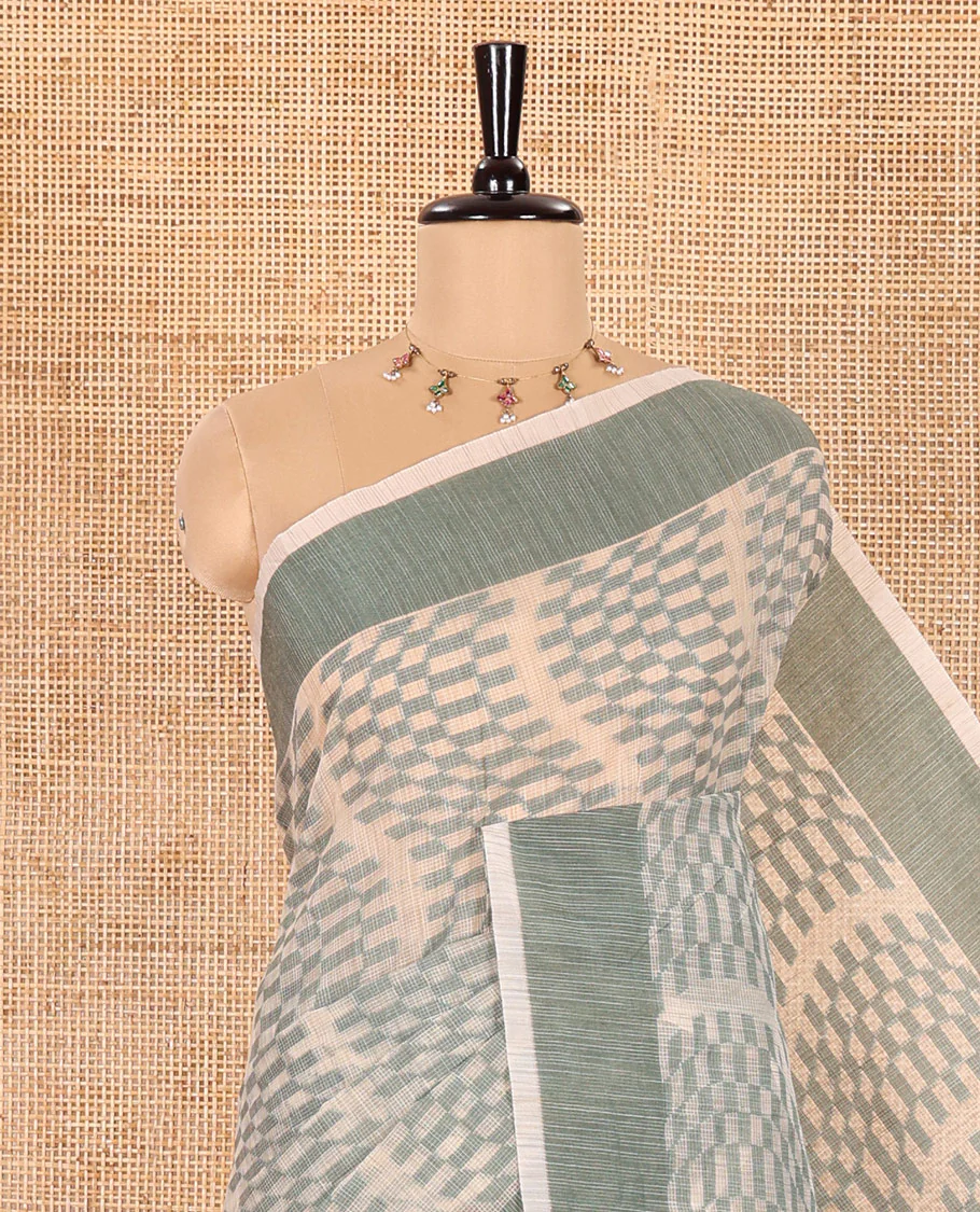 Chikku and Green Kota Cotton Saree Subtly Woven with Zig-Zag Checks in Thread, Subtly Sparkled Contrast Bavanji Border, Plain Pallu, and Paired with a Matching Blouse - Image 2