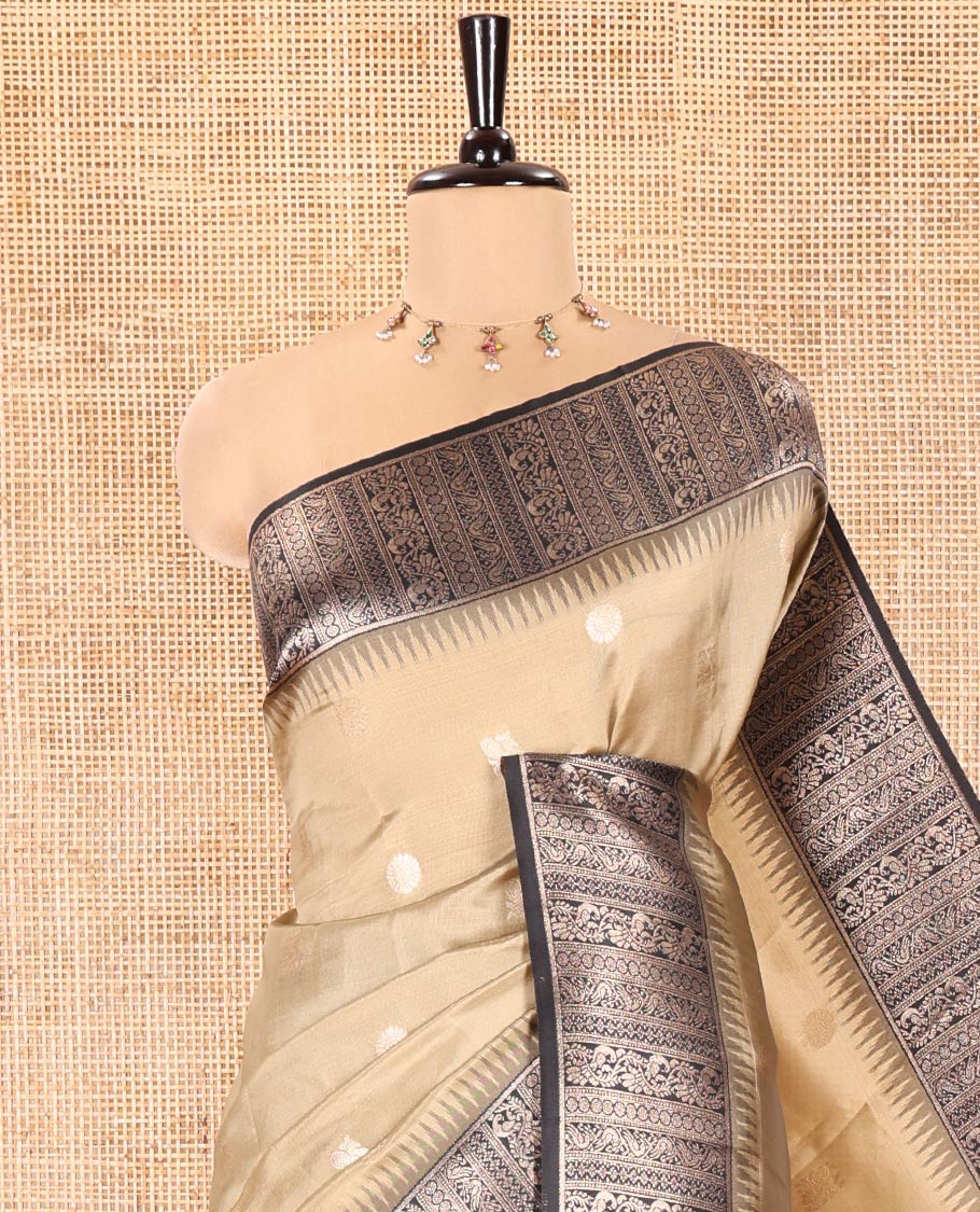 Chikku Kanchi Silk Saree, Adorned with Peacock-Chakram Buttas All Over Its Body, Complemented by a Contrast Border of Floral Creeper Designs, an Intricately Designed Pallu, and Paired with a Matching Blouse - Image 2