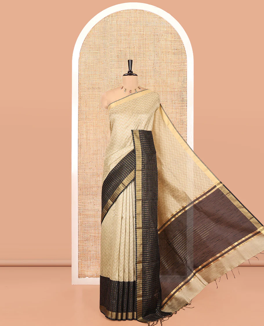 Chikku Semi-Raw Silk Saree, Delicately Woven with Zig-Zag Stripes All Over Its Body, Complemented by Contrast Border of Butta Enclosed Checks, Striped Pallu, and Paired with a Contrast Blouse