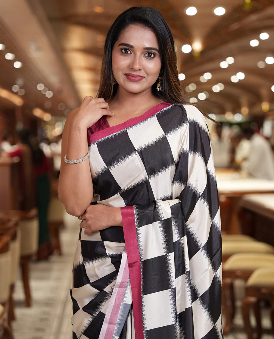 Cream and Black Satin Crepe Saree, Highlighted with Chess-Style Checked Design in Ikkat Weave, Complemented by a Contrast Border, Ikkat Chevron Printed Pallu, and Paired with a Contrast Blouse - Image 2