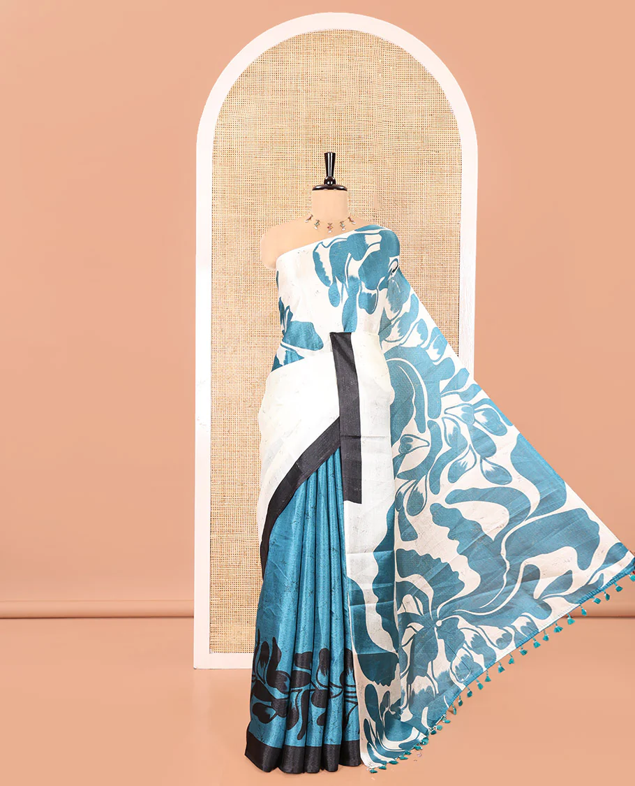 Cream and Blue Art Khadi Cotton Saree, Adorned With Half-and-Half-style Floral Print On Its Body, Highlighted by Contrast Piping Border, Self-Pallu and Paired with a Contrast Blouse