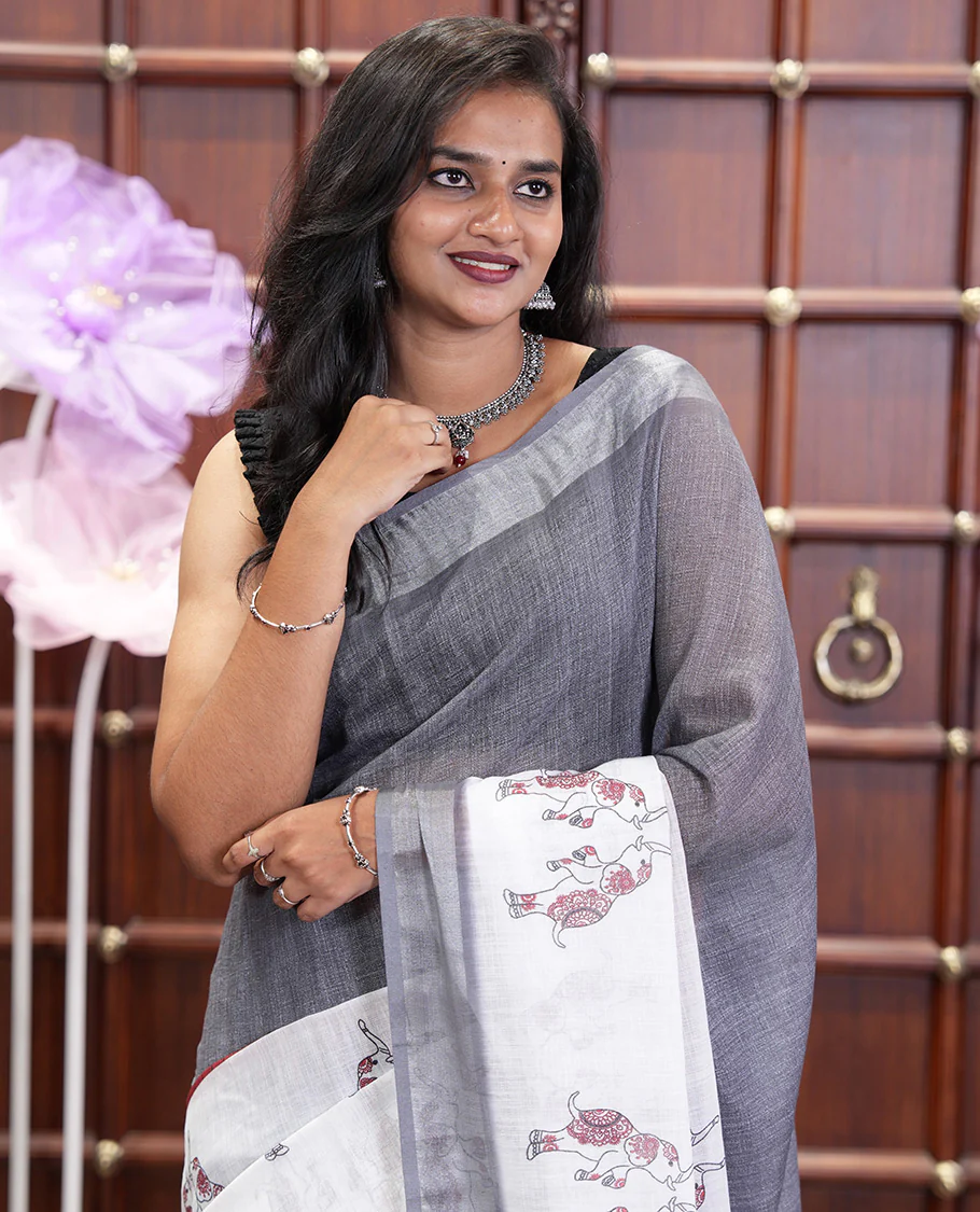 Cream and Grey Linen Cotton Saree, Subtly Sparkled with Half-and-Half Style and Elephant Motifs Printed On Its Body, Highlighted by Zari Border, Pallu of Same Print, and Paired with a Printed Blouse - Image 2