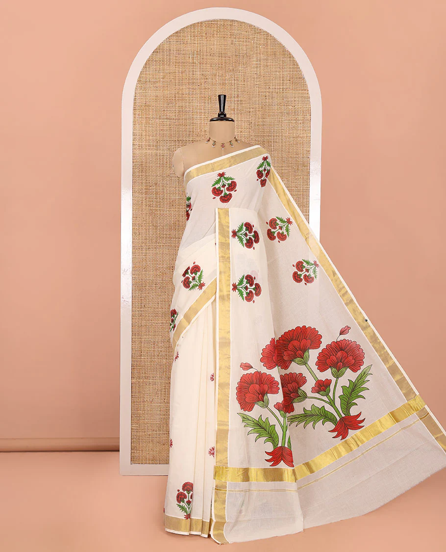 Cream and Red Kerala Cotton Saree, Detailed with Bunch of Floral Motifs Printed on Its Body, Subtle Zari Border, Pallu Features a Big Bunch of Floral Motifs Print, and Paired with a Matching Blouse