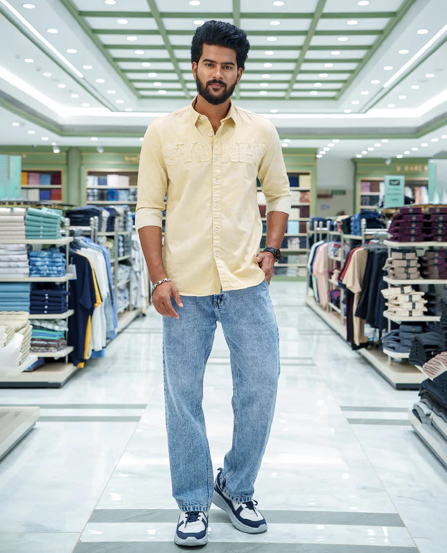 Cream Cotton Blended Casual Shirt, Bedecked with Acid-Washed and Typography Patch Embroidery on the Chest, Featuring a Spread Collar, Full Sleeves, Slim Fit, and Regular Length - Image 2