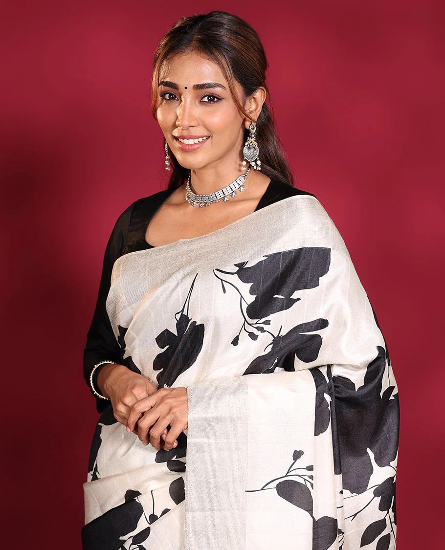 Cream Fancy Tussar Saree, Artfully Detailed with Silhouette-Style Floral Motifs Printed on Its Body, Subtle Zari-Textured Border, Pallu Pictures the Same Floral Print, and Paired with a Matching Blouse - Image 3