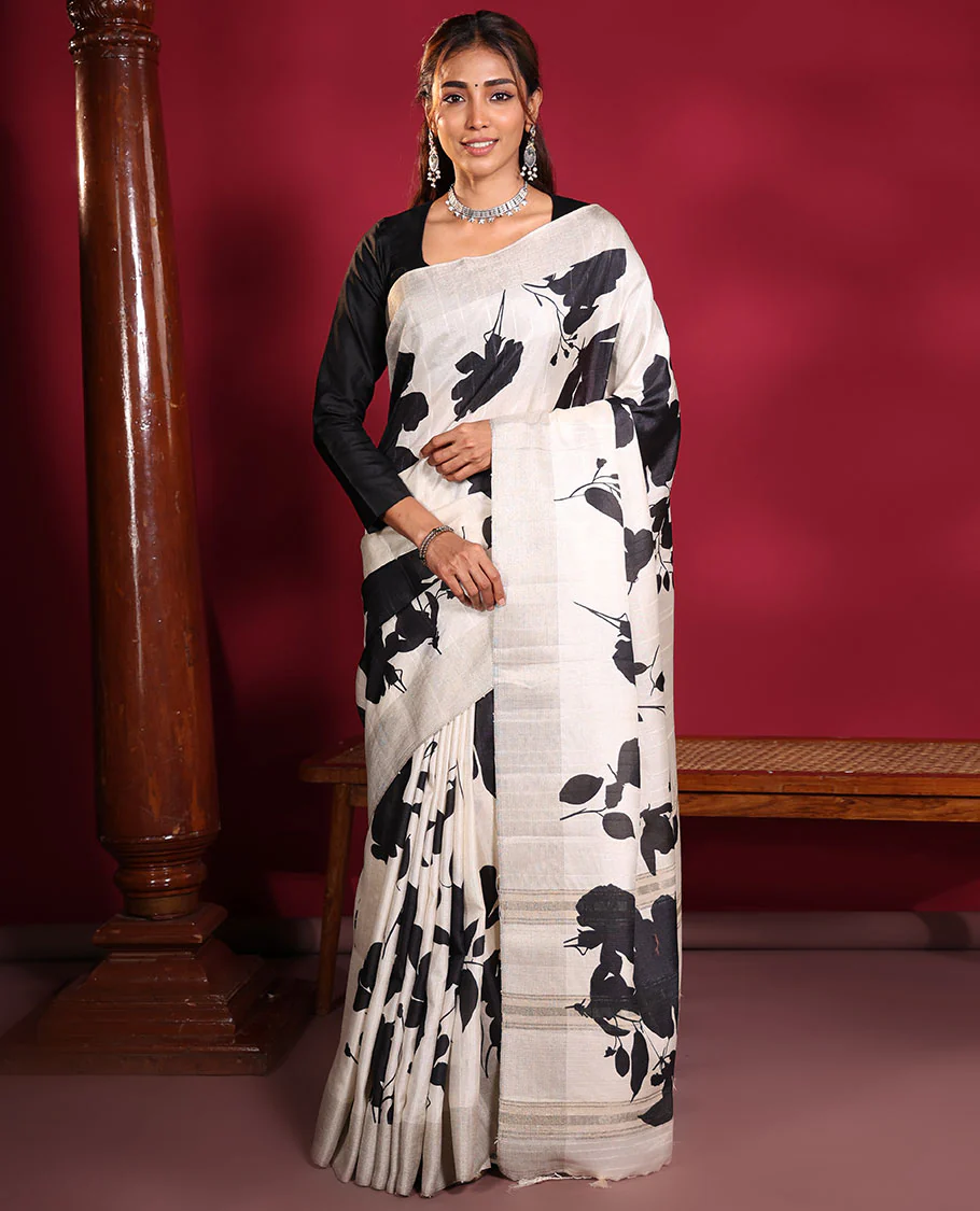 Cream Fancy Tussar Saree, Artfully Detailed with Silhouette-Style Floral Motifs Printed on Its Body, Subtle Zari-Textured Border, Pallu Pictures the Same Floral Print, and Paired with a Matching Blouse - Image 5