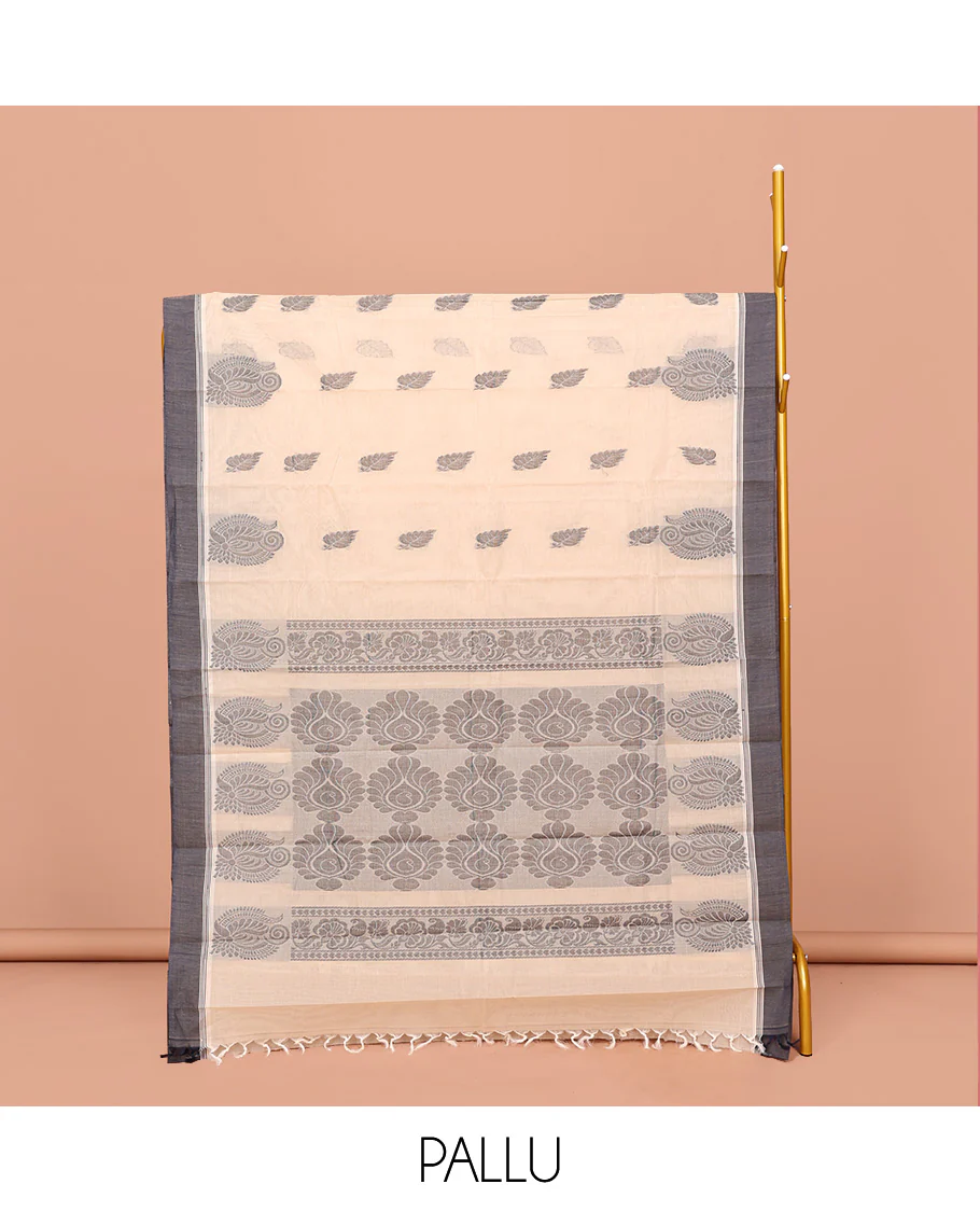 Cream Kanchi Cotton Saree, Embellished with Leaf Buttas All Over Its Body, Complemented by Contrast Border, Pallu of Intricate Designs, and Paired with a Matching Blouse - Image 2