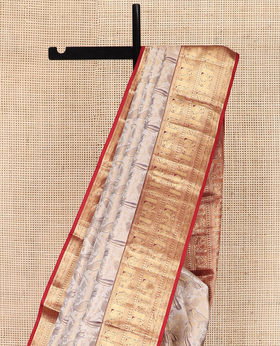 Cream Kanchipuram Silk Saree Artfully Woven with Bird Jacquard Design, Complemented by Contrast Border of Rekku, Mayil, Arumbu Manga, and Chakram Designs, Elegantly Highlighted Pallu of Geometric Patterns, and Paired with a Contrast Blouse - Image 2