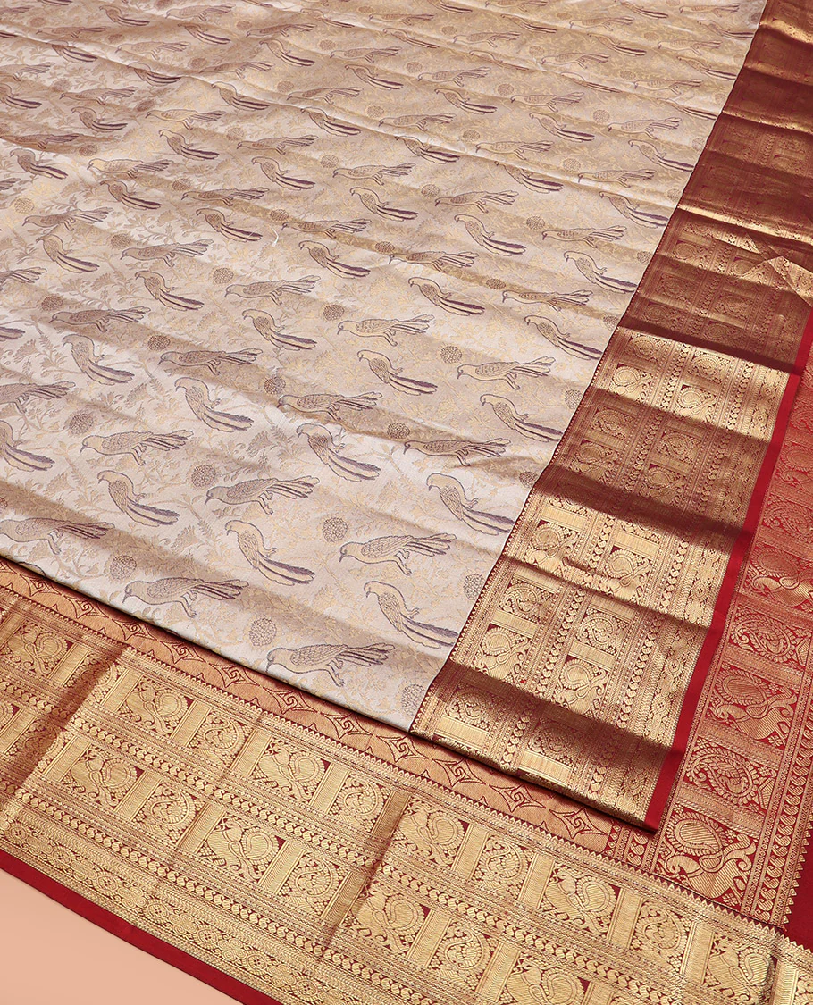 Cream Kanchipuram Silk Saree Artfully Woven with Bird Jacquard Design, Complemented by Contrast Border of Rekku, Mayil, Arumbu Manga, and Chakram Designs, Elegantly Highlighted Pallu of Geometric Patterns, and Paired with a Contrast Blouse - Image 3