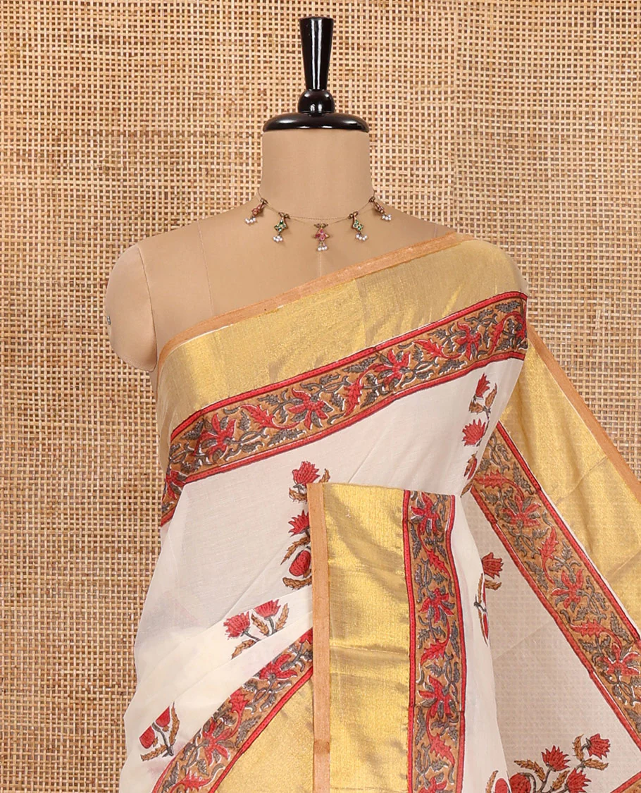 Cream Kerala Cotton Saree, Elevated with Floral Buttas Printed on Its Body, Highlighted by Gleaming Golden Zari Border, Pallu Features the Floral-Paisley Print, and Paired with a Matching Printed Blouse - Image 2