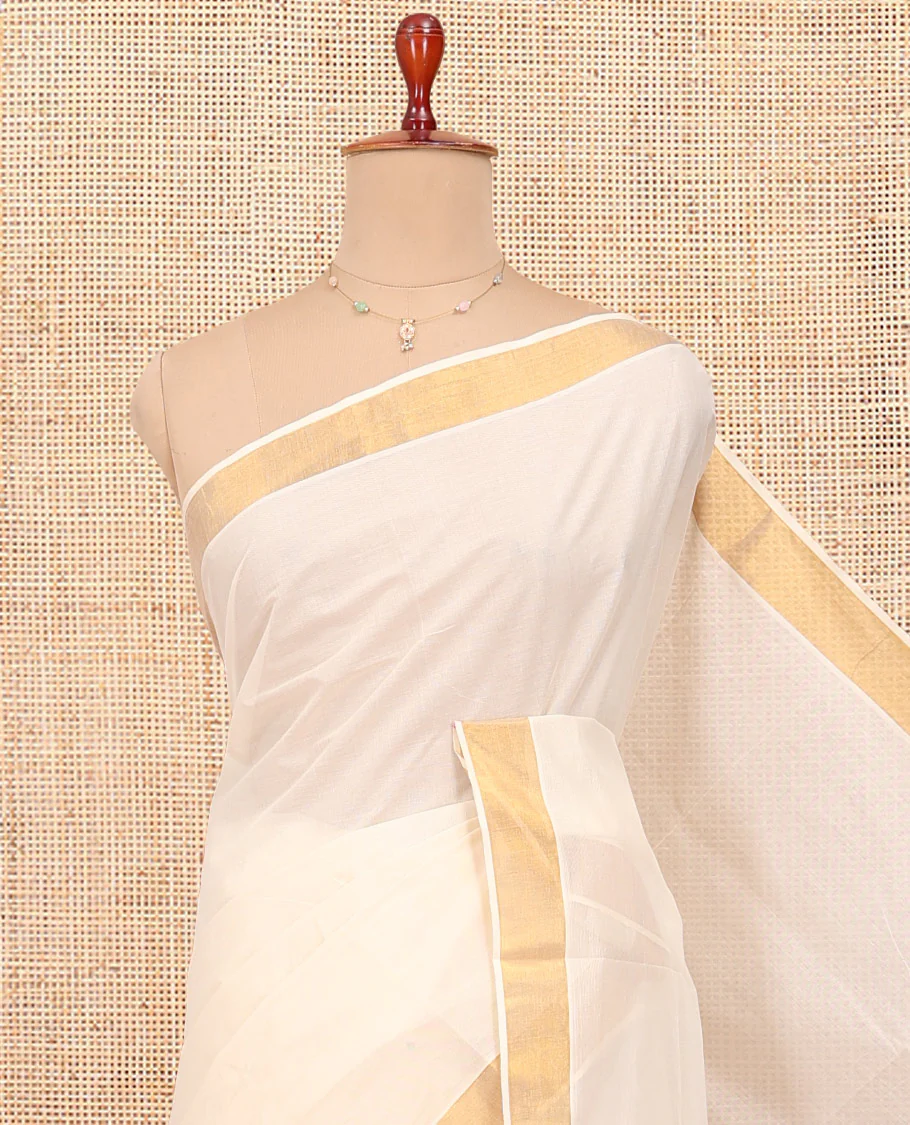 Cream Kerala Cotton Saree, Ornamented with Zari Buttas All Over Its Body, a Zari Bavanji Border, Pallu of Intricate Designs, and Paired with a Matching Blouse - Image 2