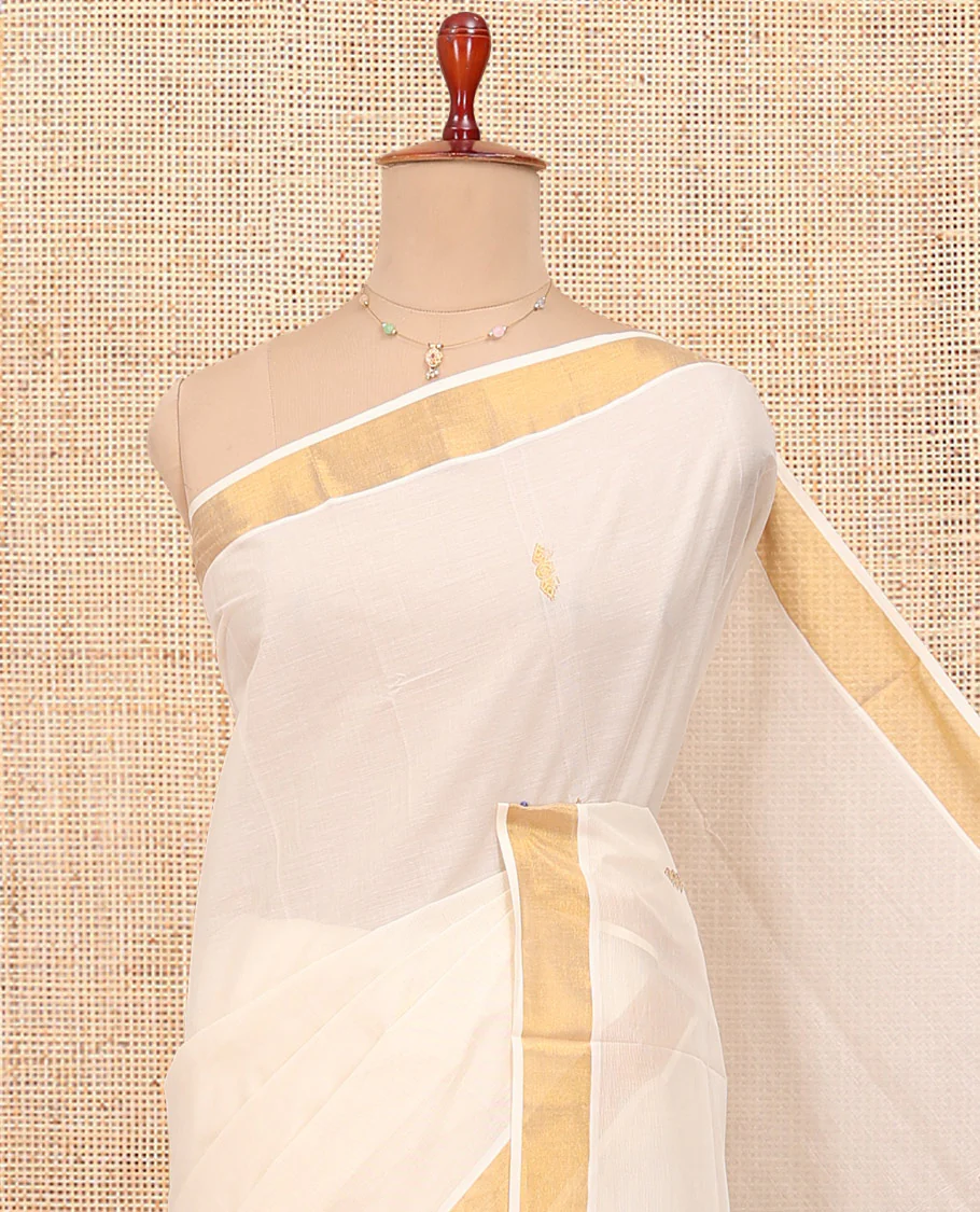 Cream Kerala Cotton Saree, Showcasing Zari Buttas All Over Its Body, a Zari Bavanji Border, Pallu of Peacock Designs, and Paired with a Matching Blouse - Image 2