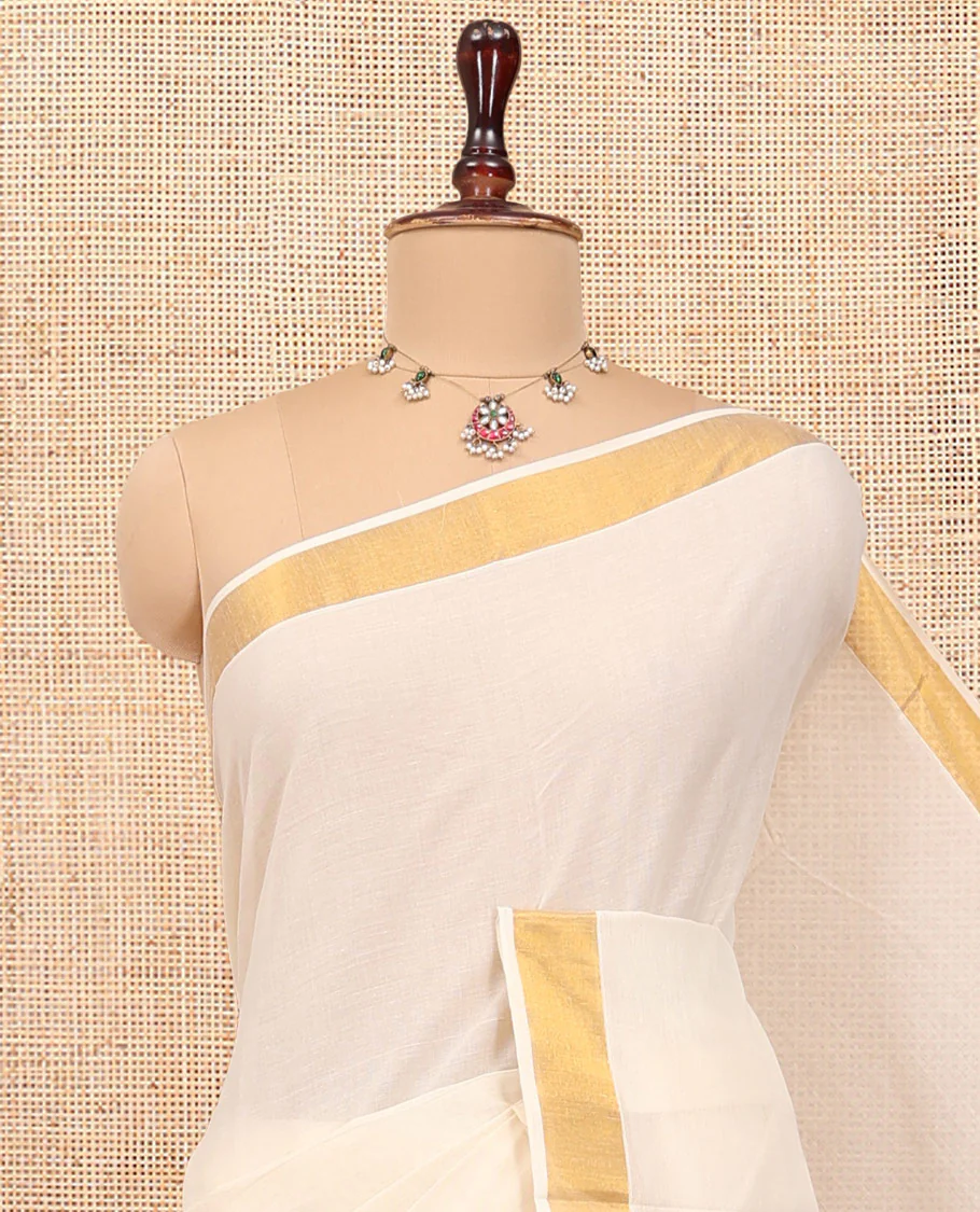 Cream Kerala Cotton Saree, Steeped with Zari Buttas All Over Its Body, a Subtle Bavanji Border, Pallu Features Stripes and Buttas, and Is Paired with a Matching Blouse - Image 2
