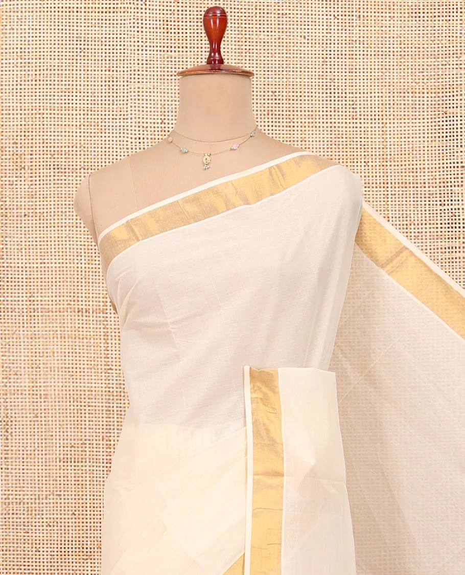 Cream Kerala Cotton Saree, Woven with Zari Buttas All Over Its Body, a Zari Bavanji Border, Pallu of Zari Designs, and Paired with a Matching Blouse - Image 2