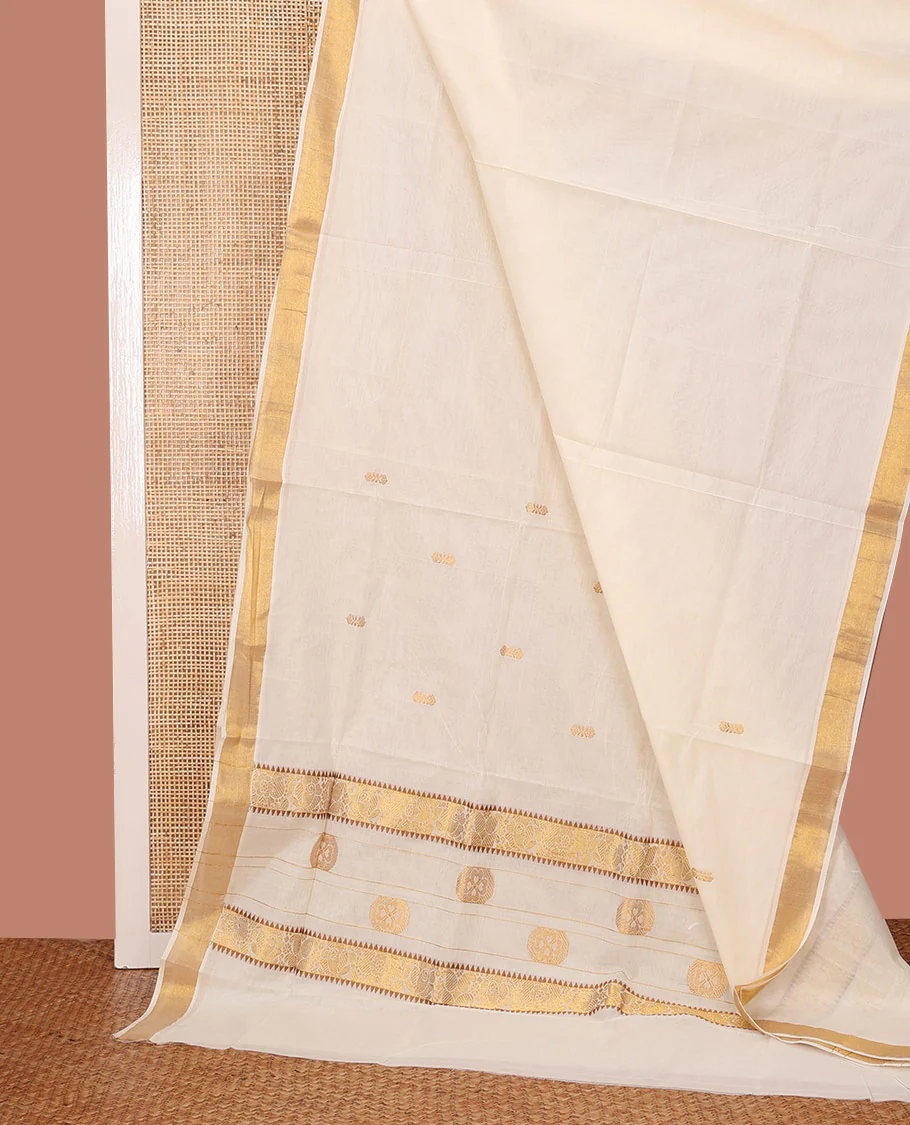 Cream Kerala Saree, Gracefully Embellished with Zari Buttas on Its Body, Bavanji Zari Border, Sparkling Zari Woven Pallu of Flower Designs, and Paired with a Matching Blouse