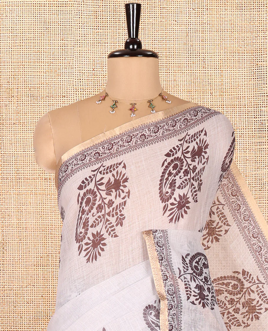 Cream Linen Cotton Saree, Decked Up with Floral-Paisley Motifs Print All Over Its Body, Highlighted by Gold Zari Printed Border, Floral-Paisley Printed Pallu and Paired with a Matching Blouse - Image 2