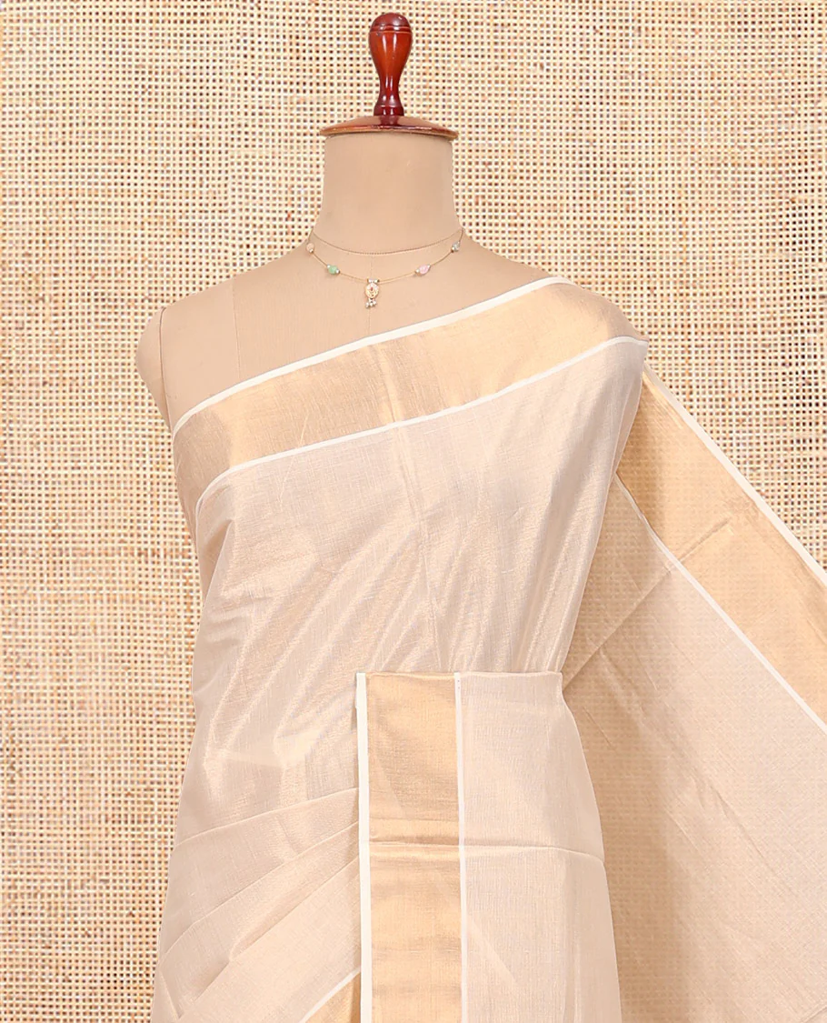 Cream Plain Kerala Cotton Saree, a Zari Bavanji Border, a Self-Pallu, and Paired with a Matching Blouse - Image 2