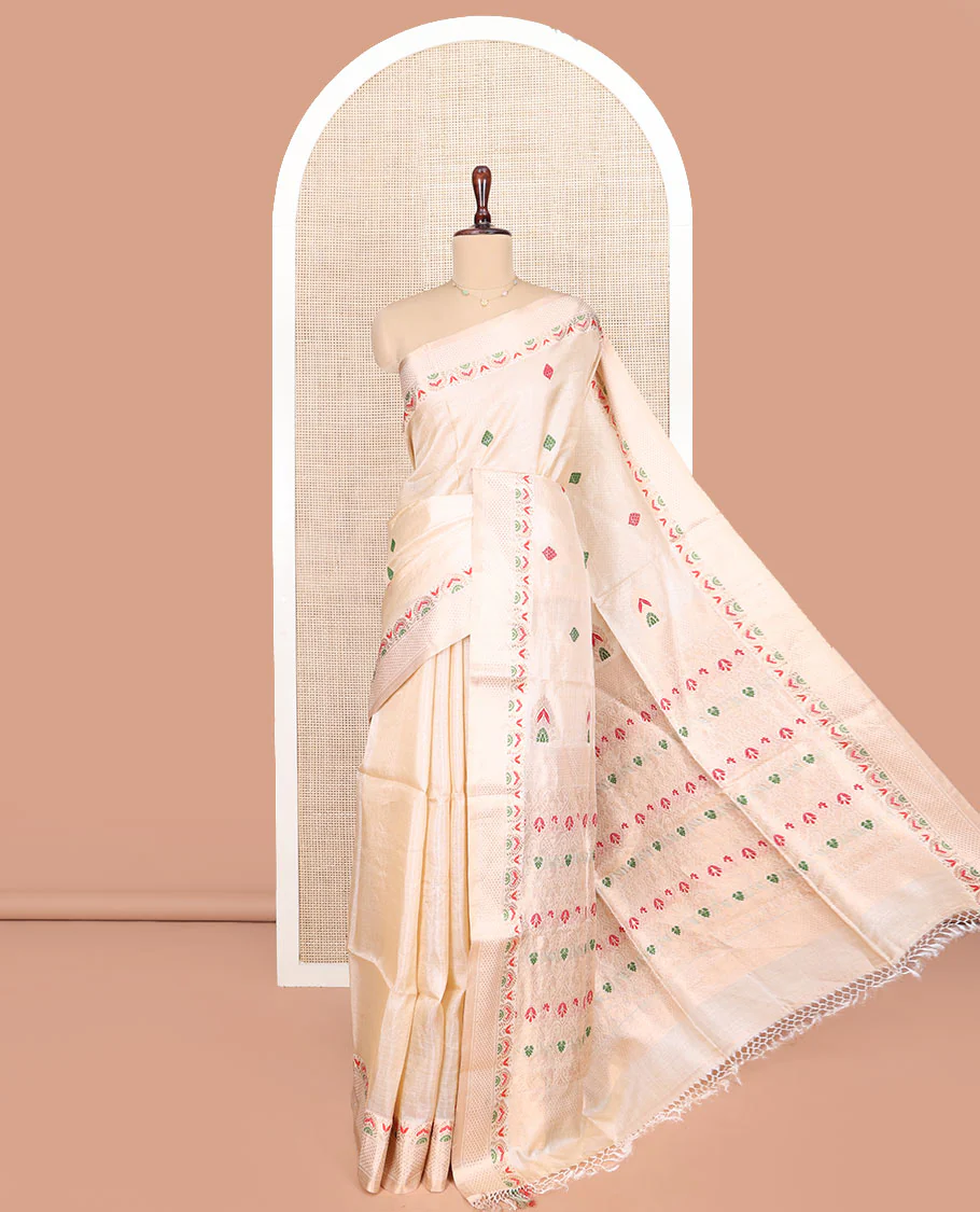 Cream Tussar Silk Saree, Woven with Buttas on Its Body, Subtle Border of Unique Motifs, Pallu of Ogee Patterns, and Paired with a Matching Blouse