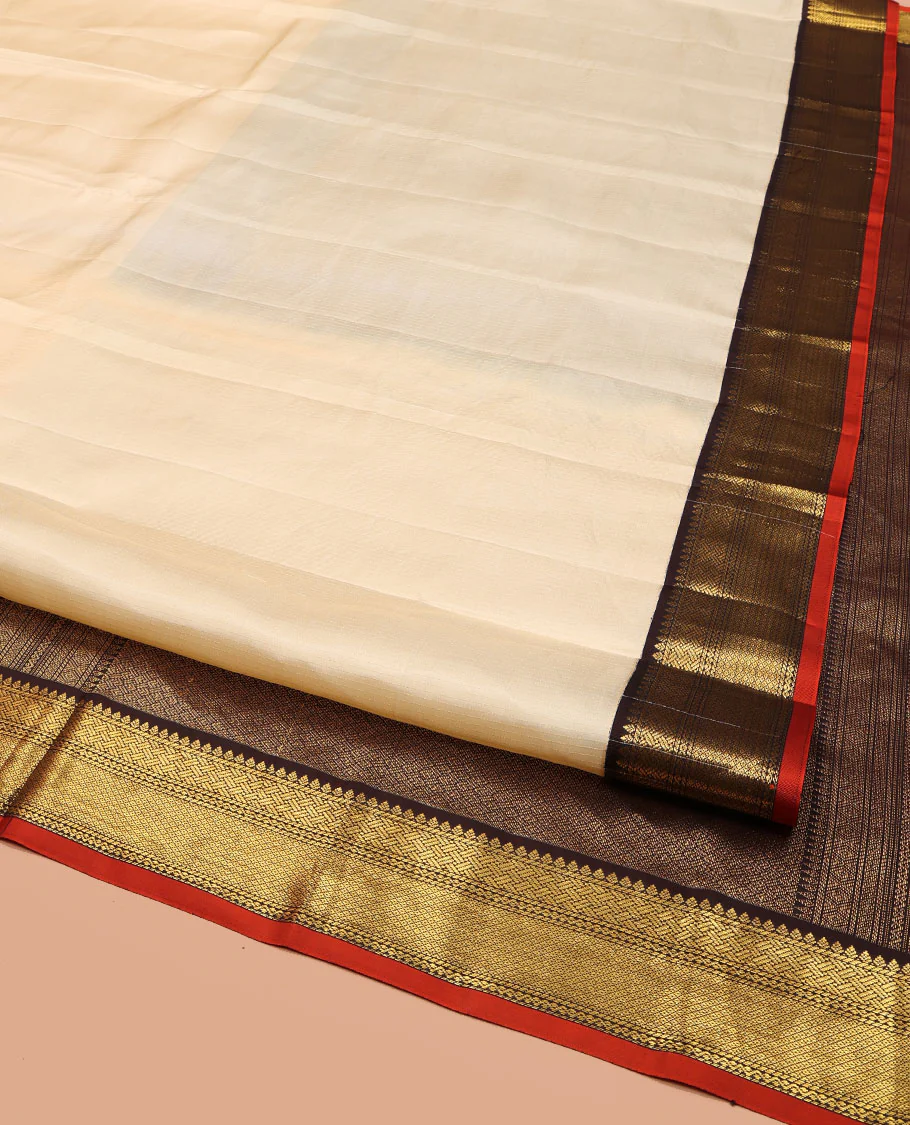Cream Vasundhara Lite Silk Mix Saree, Sparsely Woven with Stripes on Its Body, Complemented by a Contrast Border of Thilakam, Pai Yaadi, Neli, and Mayil Kann Designs, Intricately Designed Pallu, and Paired with a Contrast Blouse - Image 2