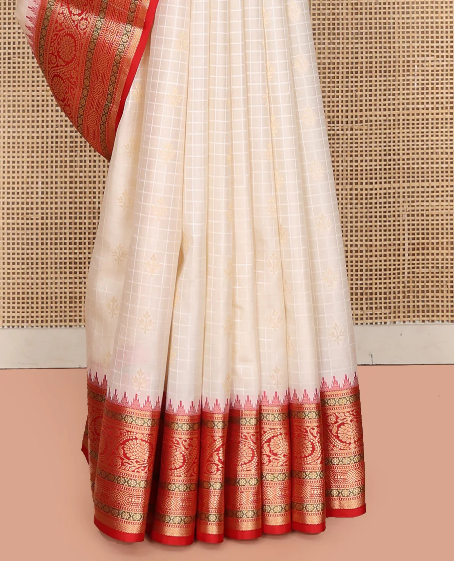Cream Vasundhara Silk Saree, Subtly Sparkled with Buttas And Checks On Its Body, Complemented by Captivating Contrast Border of Thazampoo Rekku, Muthu, Banaras, and Kodi Visiry Designs, Pallu Steeped with Manga Designs, And Paired with a Contrast Blouse - Image 10