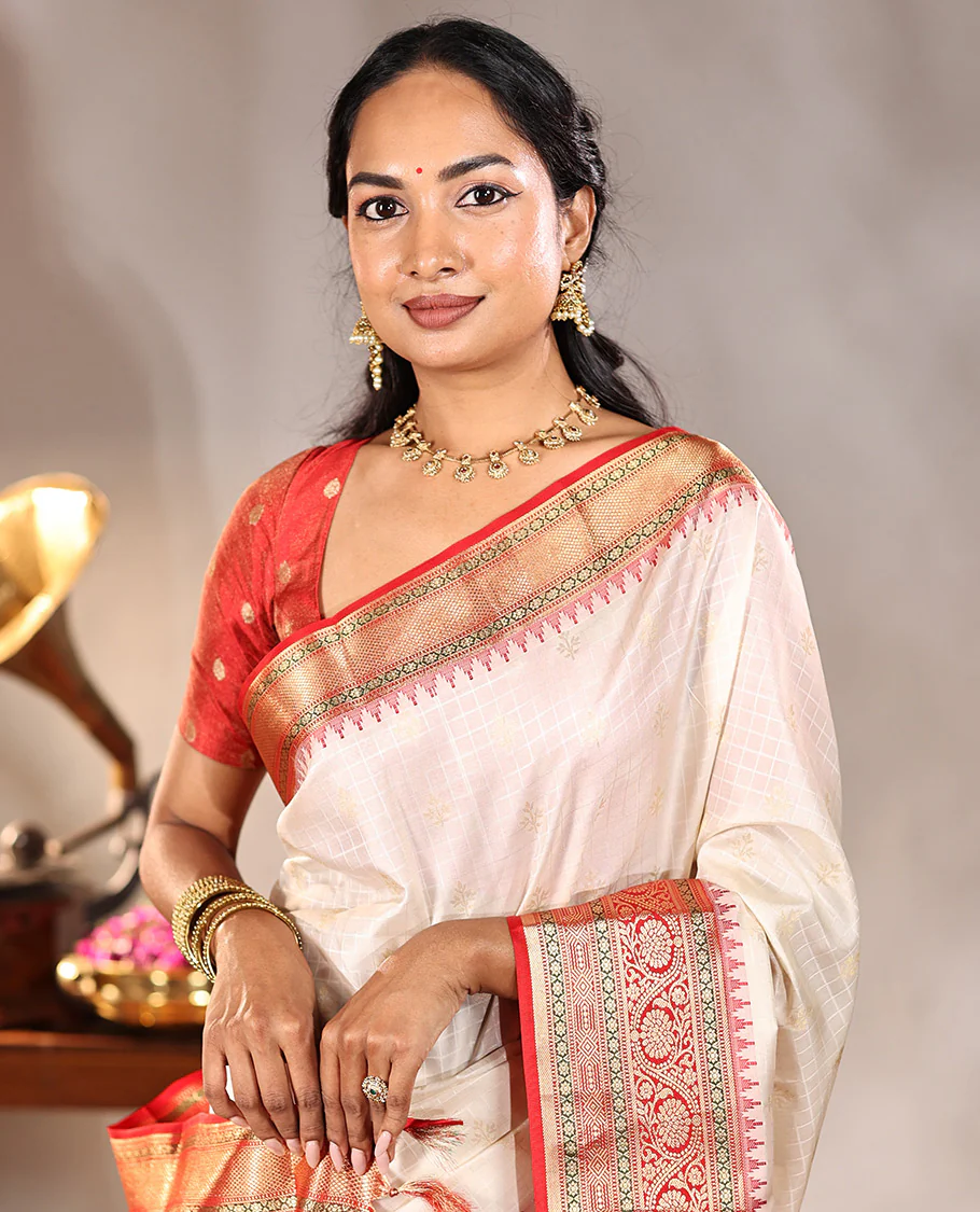 Cream Vasundhara Silk Saree, Subtly Sparkled with Buttas And Checks On Its Body, Complemented by Captivating Contrast Border of Thazampoo Rekku, Muthu, Banaras, and Kodi Visiry Designs, Pallu Steeped with Manga Designs, And Paired with a Contrast Blouse - Image 3
