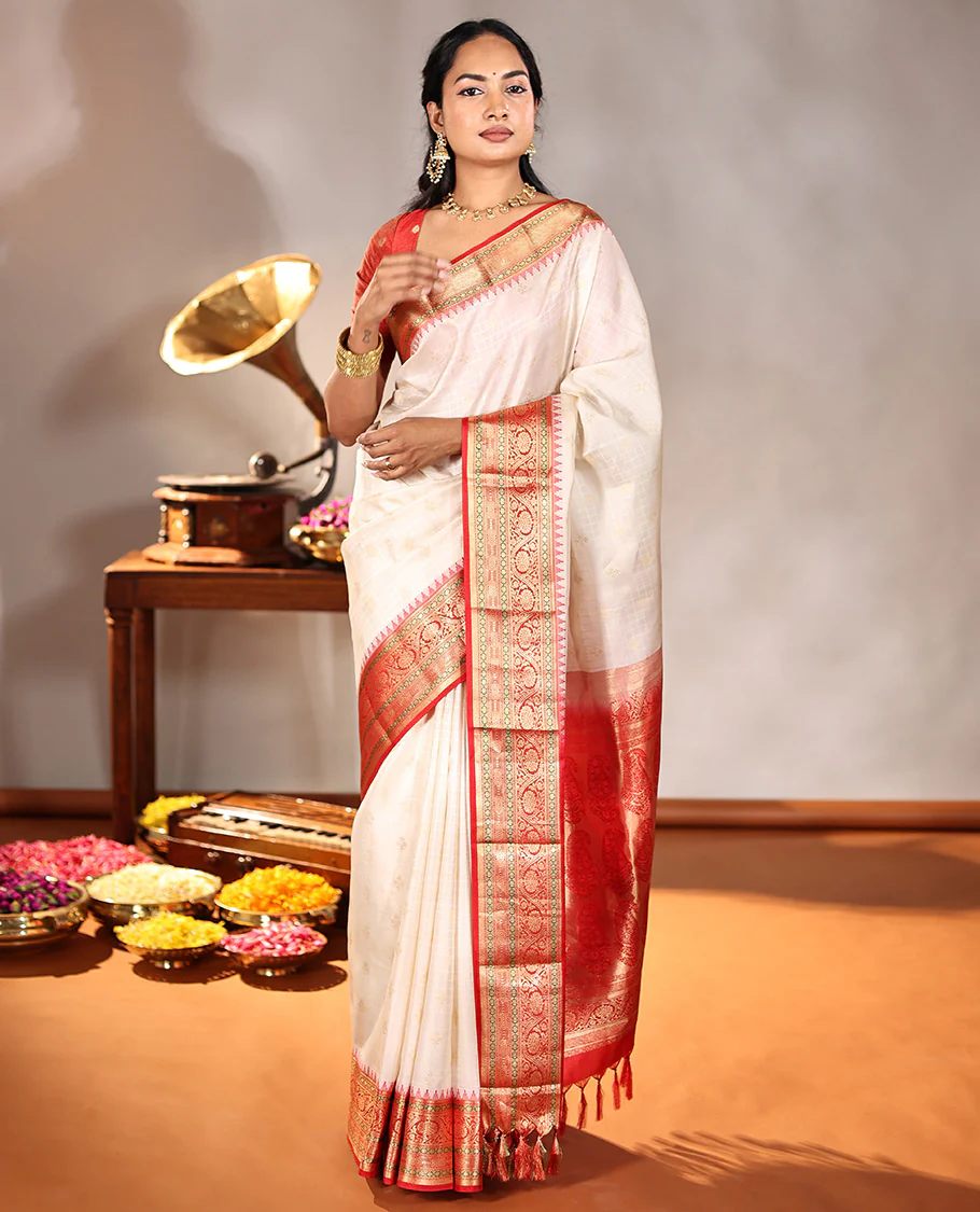 Cream Vasundhara Silk Saree, Subtly Sparkled with Buttas And Checks On Its Body, Complemented by Captivating Contrast Border of Thazampoo Rekku, Muthu, Banaras, and Kodi Visiry Designs, Pallu Steeped with Manga Designs, And Paired with a Contrast Blouse - Image 5