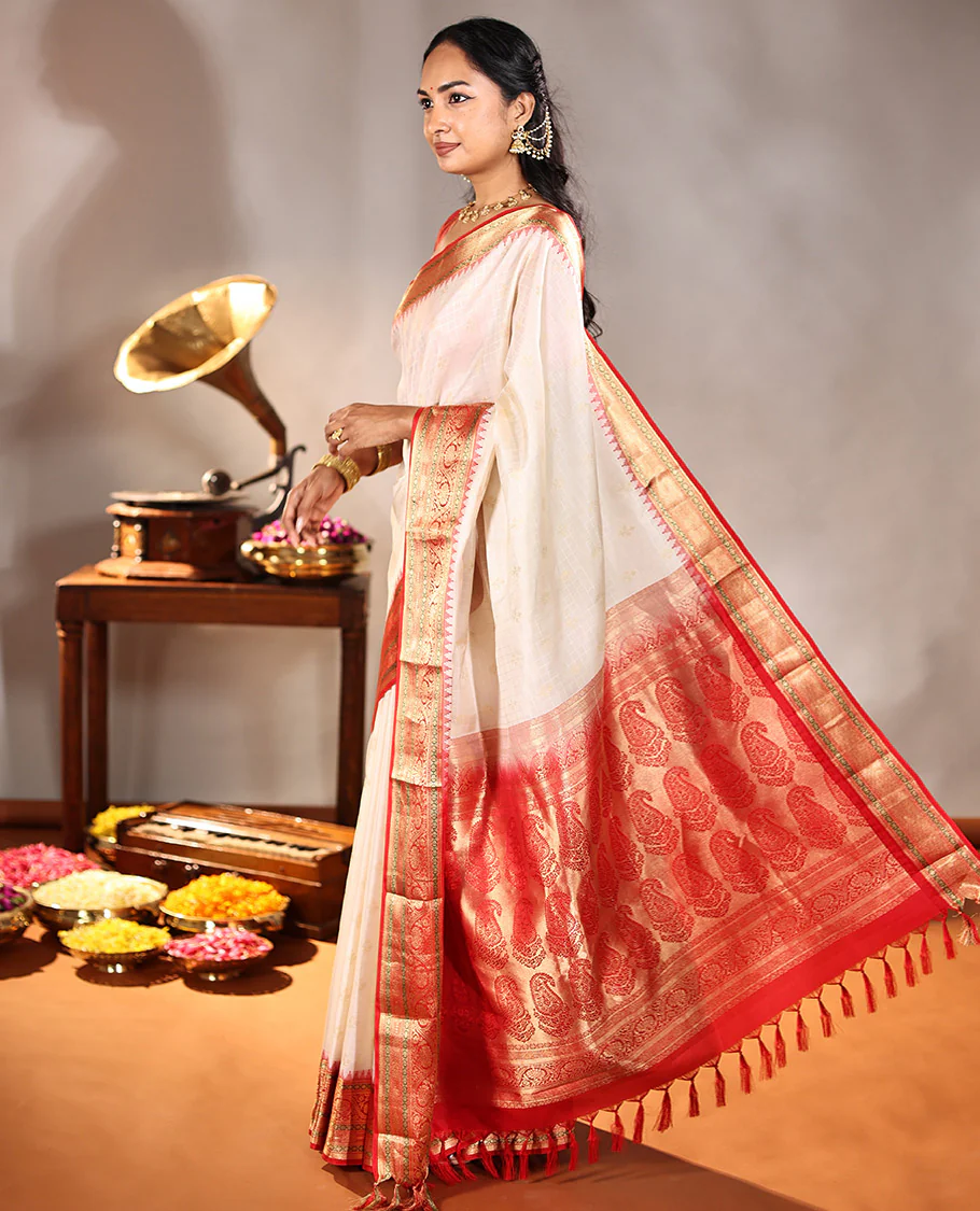 Cream Vasundhara Silk Saree, Subtly Sparkled with Buttas And Checks On Its Body, Complemented by Captivating Contrast Border of Thazampoo Rekku, Muthu, Banaras, and Kodi Visiry Designs, Pallu Steeped with Manga Designs, And Paired with a Contrast Blouse - Image 6