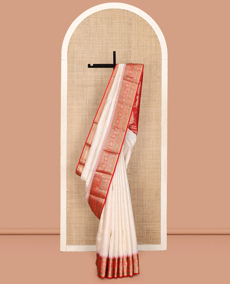 Cream Vasundhara Silk Saree, Subtly Sparkled with Buttas And Checks On Its Body, Complemented by Captivating Contrast Border of Thazampoo Rekku, Muthu, Banaras, and Kodi Visiry Designs, Pallu Steeped with Manga Designs, And Paired with a Contrast Blouse - Image 7
