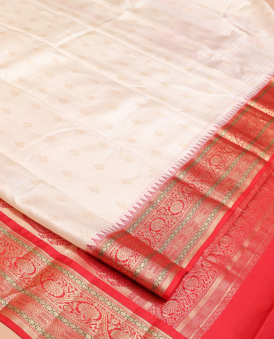 Cream Vasundhara Silk Saree, Subtly Sparkled with Buttas And Checks On Its Body, Complemented by Captivating Contrast Border of Thazampoo Rekku, Muthu, Banaras, and Kodi Visiry Designs, Pallu Steeped with Manga Designs, And Paired with a Contrast Blouse - Image 8