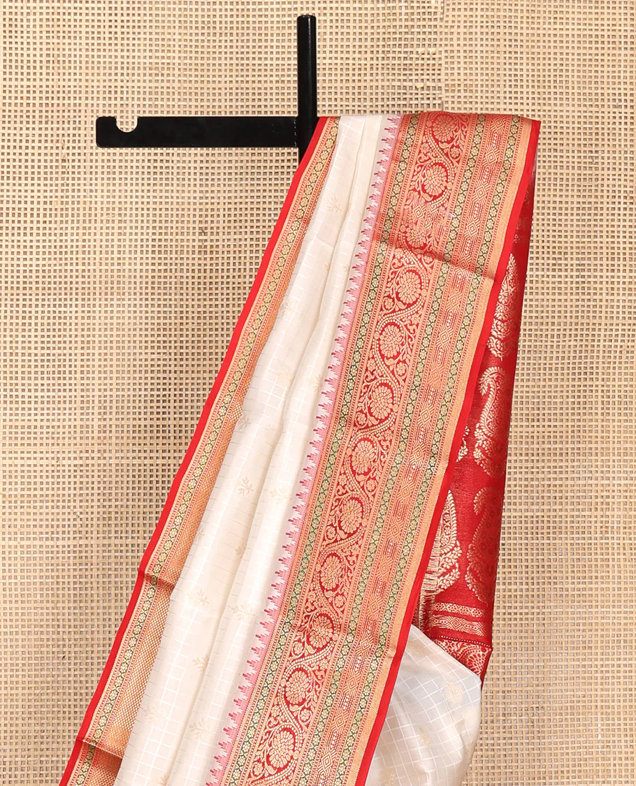 Cream Vasundhara Silk Saree, Subtly Sparkled with Buttas And Checks On Its Body, Complemented by Captivating Contrast Border of Thazampoo Rekku, Muthu, Banaras, and Kodi Visiry Designs, Pallu Steeped with Manga Designs, And Paired with a Contrast Blouse - Image 9