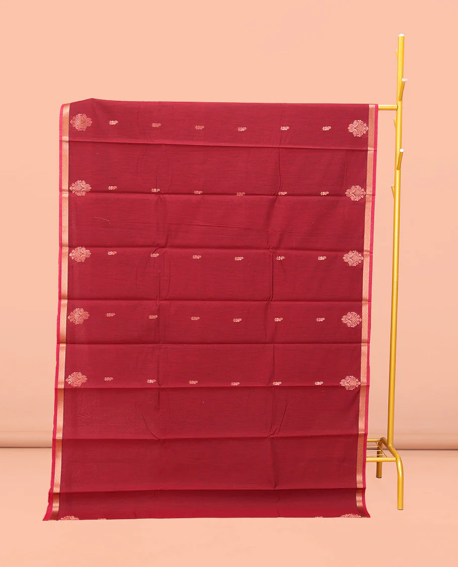 Crimson Red Semi-Silk Cotton Saree, Enriched with Zari Buttas All Over Its Body, a Subtle Zari Piping Border, Complemented by Contrast Pallu of Peacock Butta Enclosed Checked Design, and Paired with a Contrast Blouse