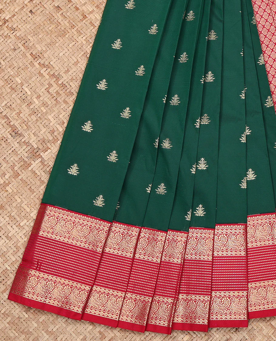 Dark Green Budget Silk Saree, Featuring Zari Buttas All Over Its Body, Complemented by a Contrast Traditional Zari Design Border, Grand Jaal Pallu, and Paired with a Contrast Blouse