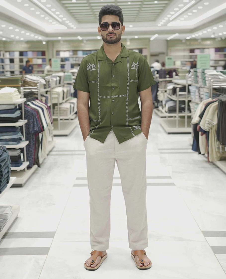 Dark Green Cotton-Blended Casual Shirt, Subtle Sparkled with Contemporary Prints, Comes with a Cuban Collar, Half-Sleeves, Regular Fit, and Regular Length - Image 2