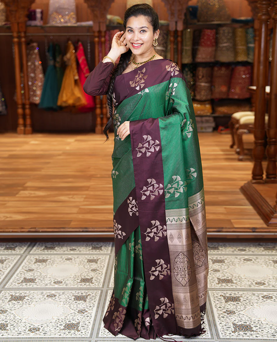 Dark Green Semi-Soft Silk Saree, Highlighted by Vaira Oosai Stripes and Floral Buttas All Over Its Body, Complemented by a Contrast Floral Buttas Border, an Intricately Designed Pallu, and Paired with a  Contrast Blouse