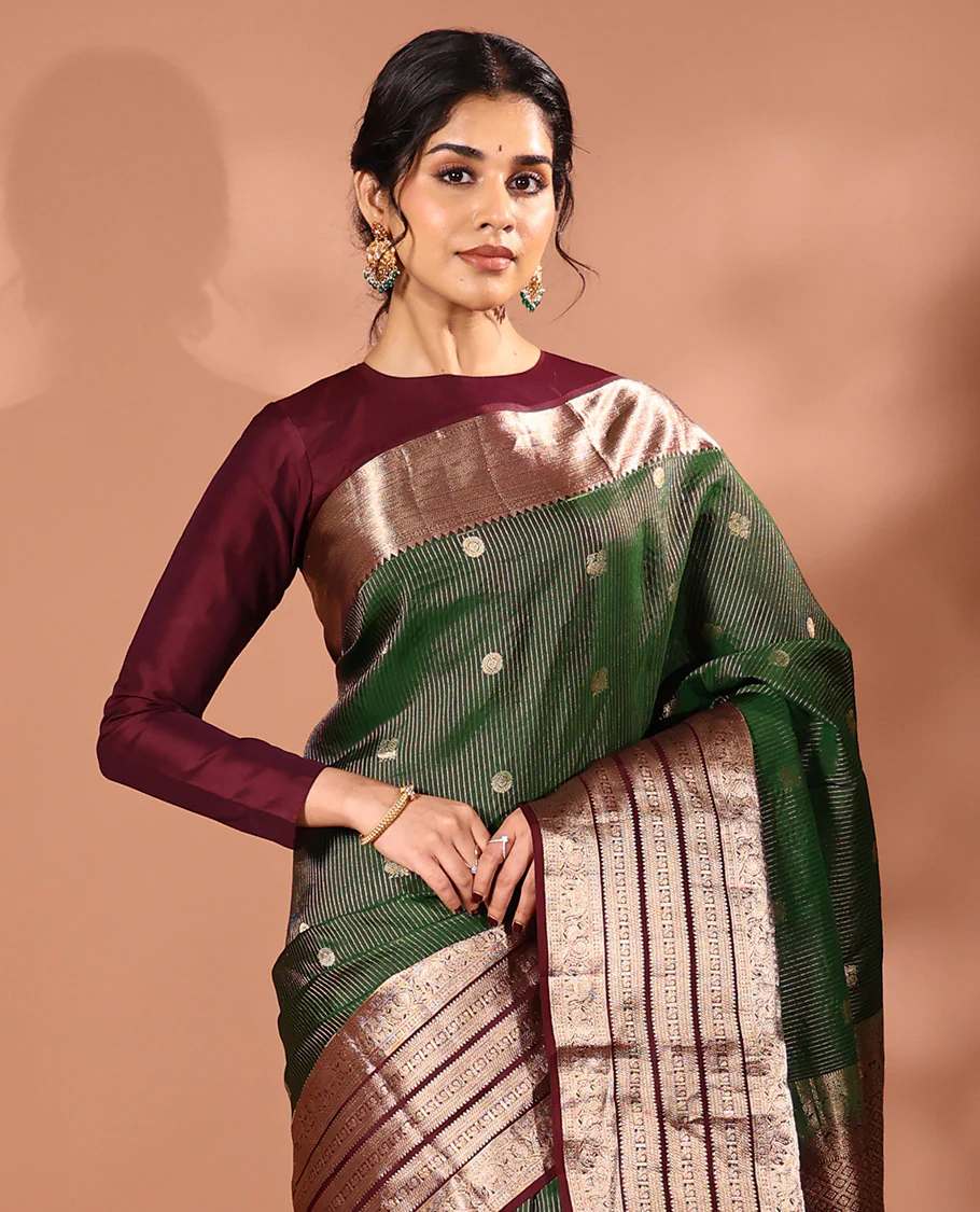 Emerald green striped and annam chakram buttas Vasundhara silk saree, contrast varisai pettu border of rekku, mayil and yaanai designs, and zari rich intricate pallu - Image 2