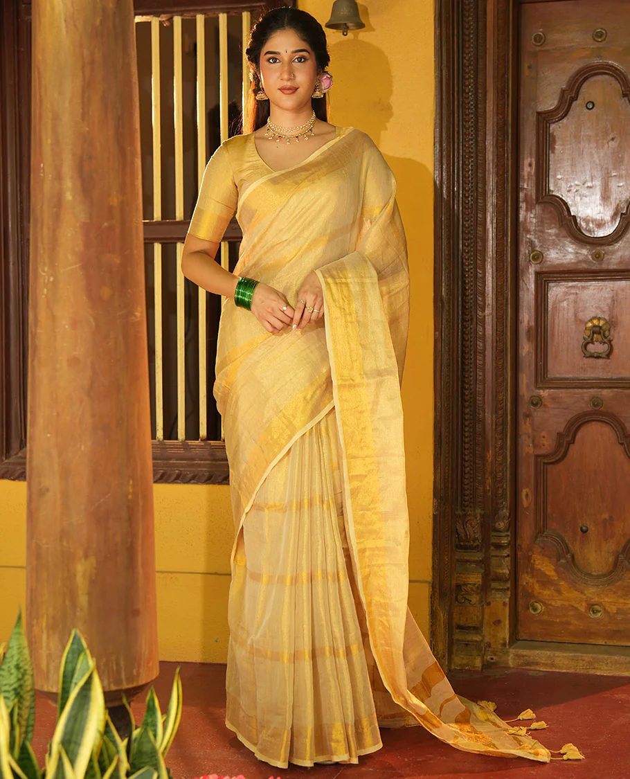 Gleaming Gold Khadi Tissue Saree, Elevated with Zari Stripes All Over Its Body, Highlighted by Zari Bavanji Border, Zari Striped Pallu, and Paired with a Matching Blouse - Image 2